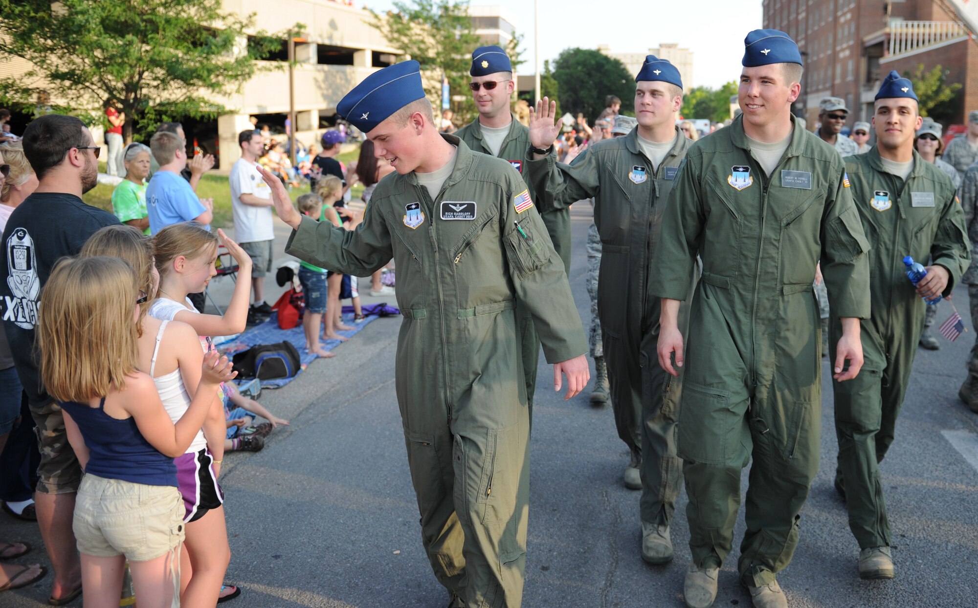 U.S. Air Force Academy, Colorado Springs, Col., cadets walk alongside 22nd Air Refueling Wing members during the 2011 Wichita River Festival parade, June 3, 2011, Wichita, Kan.  The cadets are part of the 2011 Operation Air Force program that places cadets before their junior year in operational Air Force units.  (U.S. Air Force photo/Airman 1st Class Armando A. Schwier-Morales)