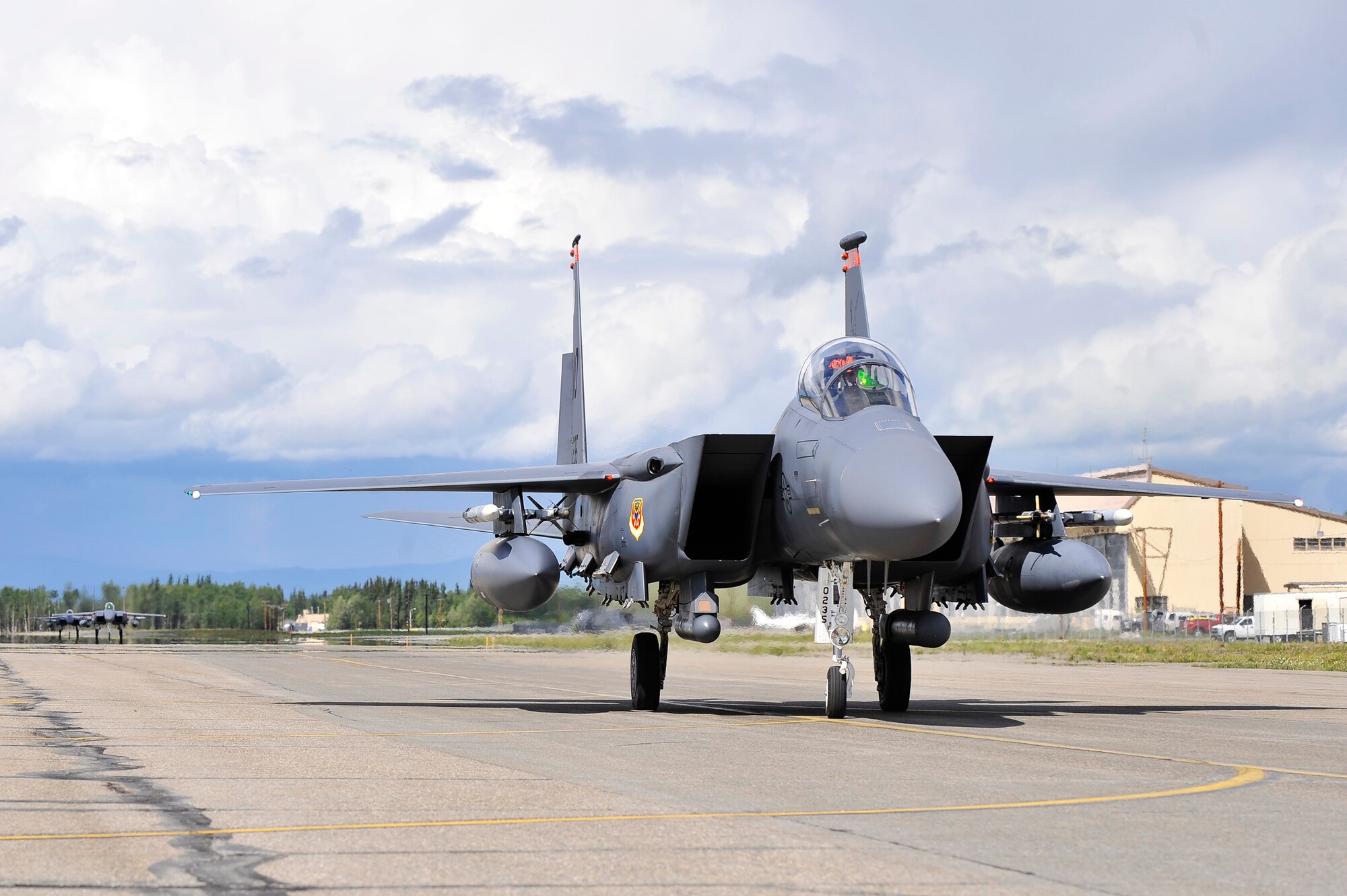 An F-15E Strike Eagle taxis on the ramp after completing the first sortie of NORTHERN EDGE 2011 June 13, Eielson Air Force Base, Alaska. NORTHERN EDGE 2011 is a joint training exercise designed to practice operations, techniques and procedures, and enhance interoperability among the services. The Strike Eagle is assigned to the 391st Fighter Squadron, Mountain Home AFB, Idaho. (U.S. Air Force photo/Staff Sgt. Christopher Boitz)