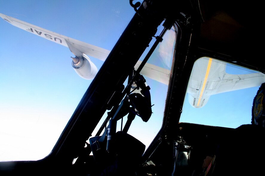 A KC-135R Stratotanker from the 157th Air Refueling Wing of the New Hampshire Air National Guard at Pease Air National Guard Base, N.H., refuels a C-5M Super Galaxy from Dover Air Force Base, Del., over northern Canada on June 5, 2011. The C-5M's mission was to complete the first Arctic overflight from Dover AFB to Bagram Airfield, Afghanistan. The plane successfully landed at Bagram just over 15 hours after take-off on June 6, 2011. (U.S. Air Force Photo/Master Sgt. Scott T. Sturkol)