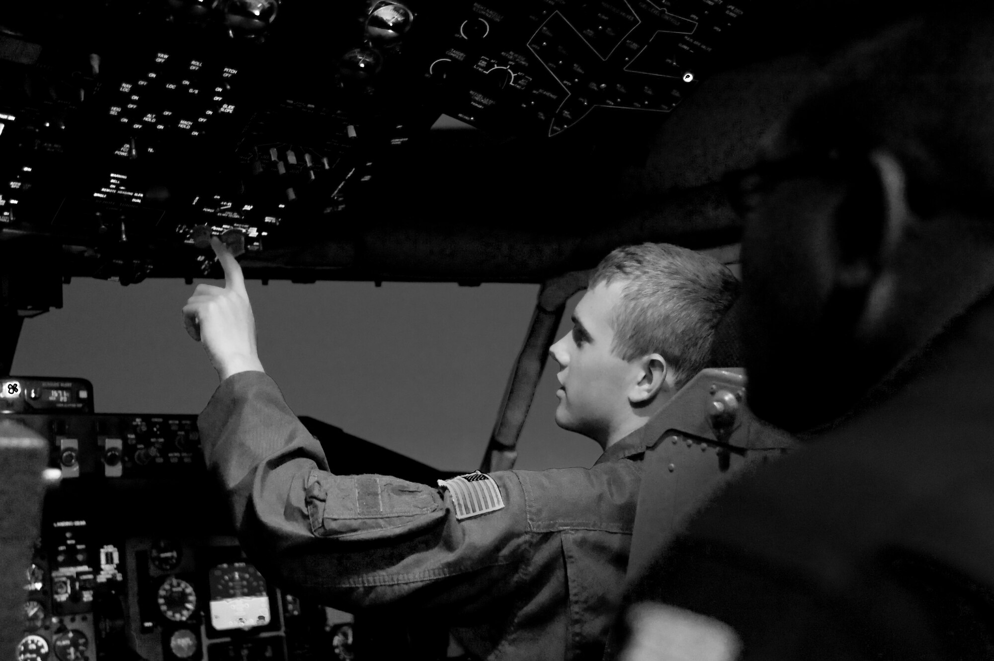 Cadet 2nd Class Richard Gangloff, Air Force Academy, Colorado Springs, Col., performs a preflight check in the KC-135 Stratotanker simulator June 8, 2011, McConnell Air Force Base, Kan. Cadet Gangloff, along with four others, came to McConnell to get a hands-on experience of the operational Air Force. (U.S. Air Force photo/Airman 1st Class Armando A. Schwier-Morales)  