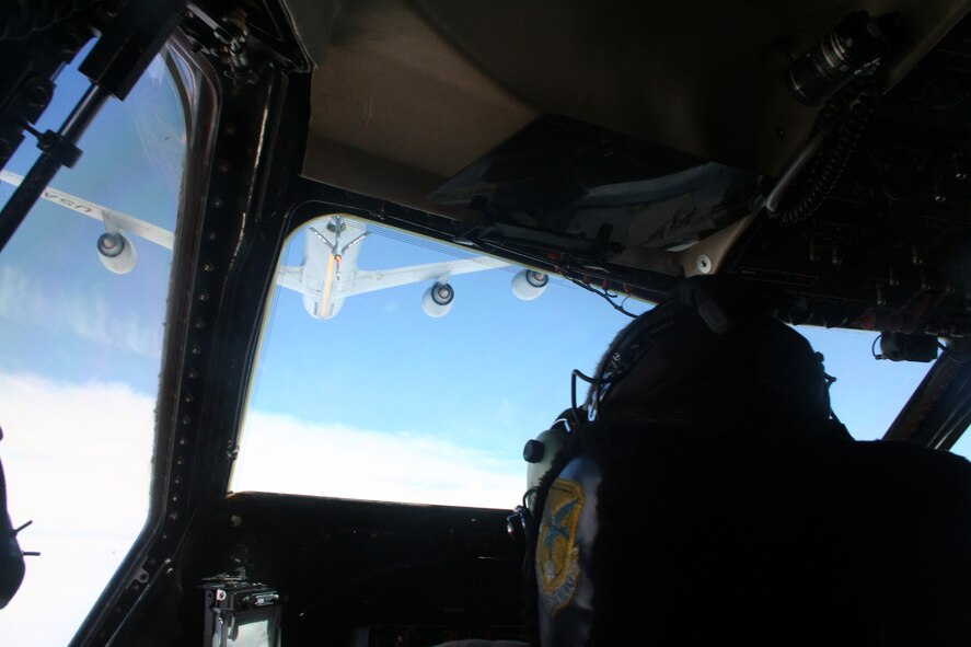 A KC-135R Stratotanker from the 157th Air Refueling Wing of the New Hampshire Air National Guard at Pease Air National Guard Base, N.H., prepares to refuel a C-5M Super Galaxy from Dover Air Force Base, Del., over northern Canada on June 5, 2011. The C-5M's mission was to complete the first Arctic overflight from Dover AFB to Bagram Airfield, Afghanistan. The plane successfully landed at Bagram just over 15 hours after take-off on June 6, 2011. (U.S. Air Force Photo/Master Sgt. Scott T. Sturkol)