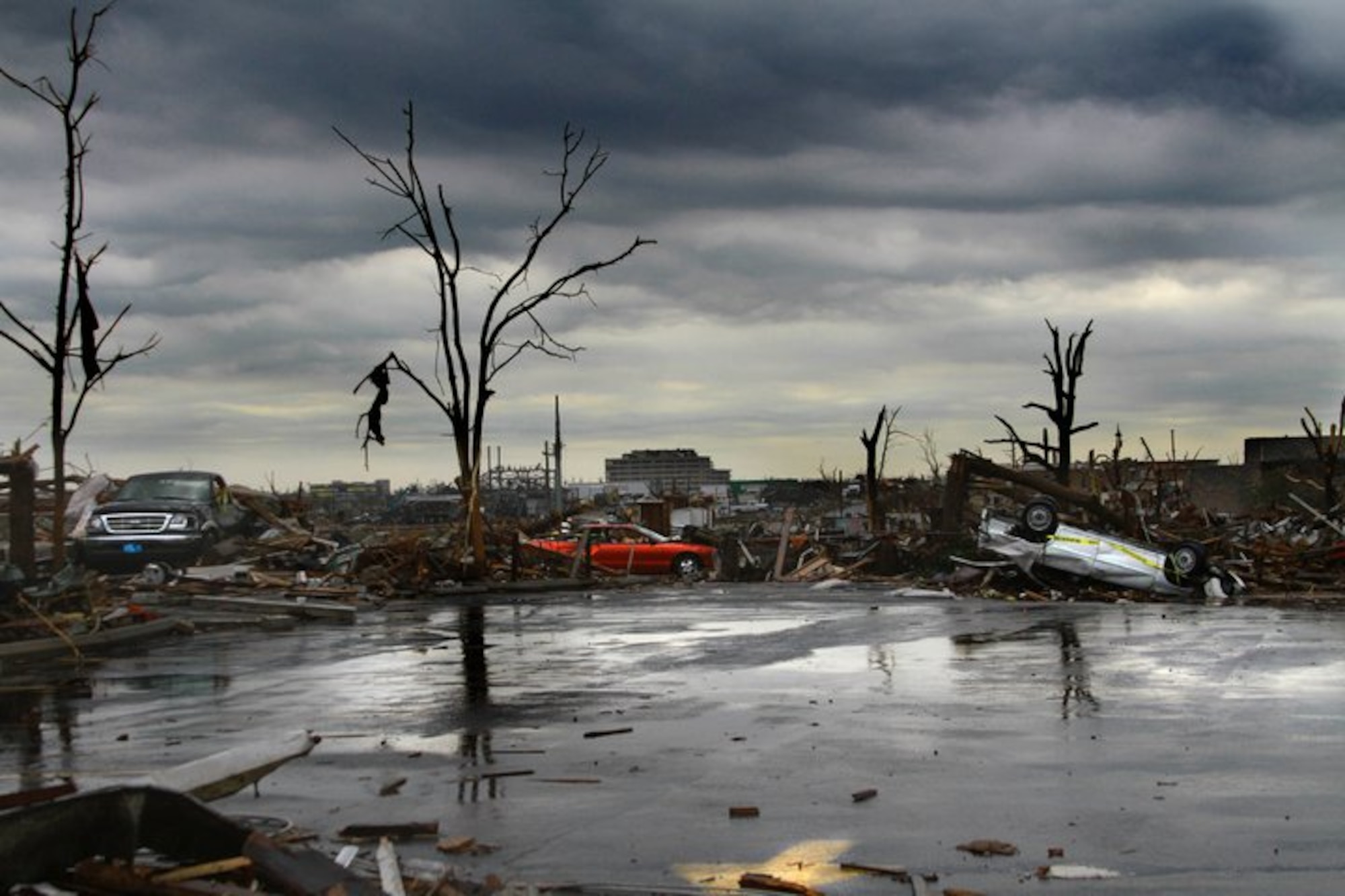 JOPLIN, Mo. -- Volunteers from Scott Air Force Base traveled to Joplin, Mo., in the weeks following a EF5 tornado that passed through the town May 22. The tornado left 153 people dead and damaged more than 8,000 homes, schools and the St. John’s Medical Center. (U.S. Air Force Photo by Tech. Sgt. Melissa Calabrese)