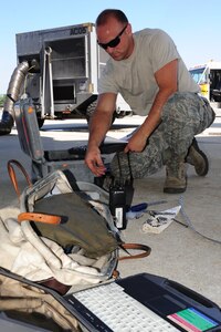 Staff Sgt. Brandon Padgett assembles the tools he needs to install a slat seal on the left wing of a C-17 aircraft during Rodeo practice on Joint Base Charleston June 10. Sergeant Padgett is assigned to the 437th Aircraft maintenance squadron and is a member of the 437th Airlift Wing 2011 Air Mobility Command Rodeo team (U.S. Air Force photo/Tech. Sgt. Chrissy Best)
