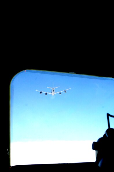 A KC-135R Stratotanker from the 157th Air Refueling Wing of the New Hampshire Air National Guard at Pease Air National Guard Base, N.H., gets in track to refuel a C-5M Super Galaxy from Dover Air Force Base, Del., over northern Canada on June 5, 2011. The C-5M's mission was to complete the first Arctic overflight from Dover AFB to Bagram Airfield, Afghanistan. The plane successfully landed at Bagram just over 15 hours after take-off on June 6, 2011. (U.S. Air Force Photo/Master Sgt. Scott T. Sturkol)