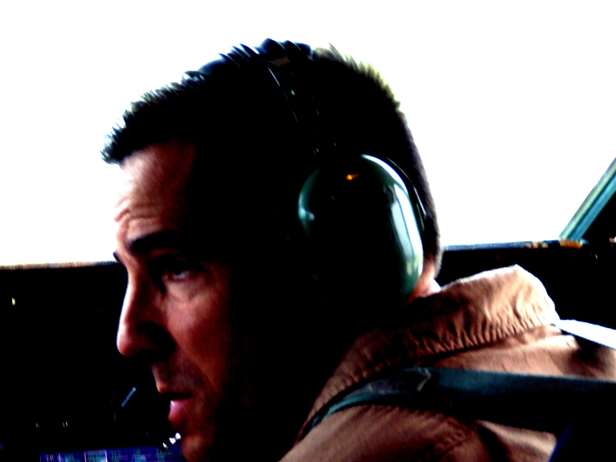 Lt. Col. Scott Erickson, C-5 pilot, flies a C-5M Super Galaxy for a mission on June 5, 2011, from Dover Air Force Base, Del. The plane was departing for the Air Force's first direct delivery airlift mission through the Arctic Circle from Dover AFB to Bagram Airfield, Afghanistan. Colonel Erickson is from the Air Force Reserve's 709th Airlift Squadron at Dover AFB and his  hometown is Lombard, Ill.  (U.S. Air Force Photo/Master Sgt. Scott T. Sturkol)