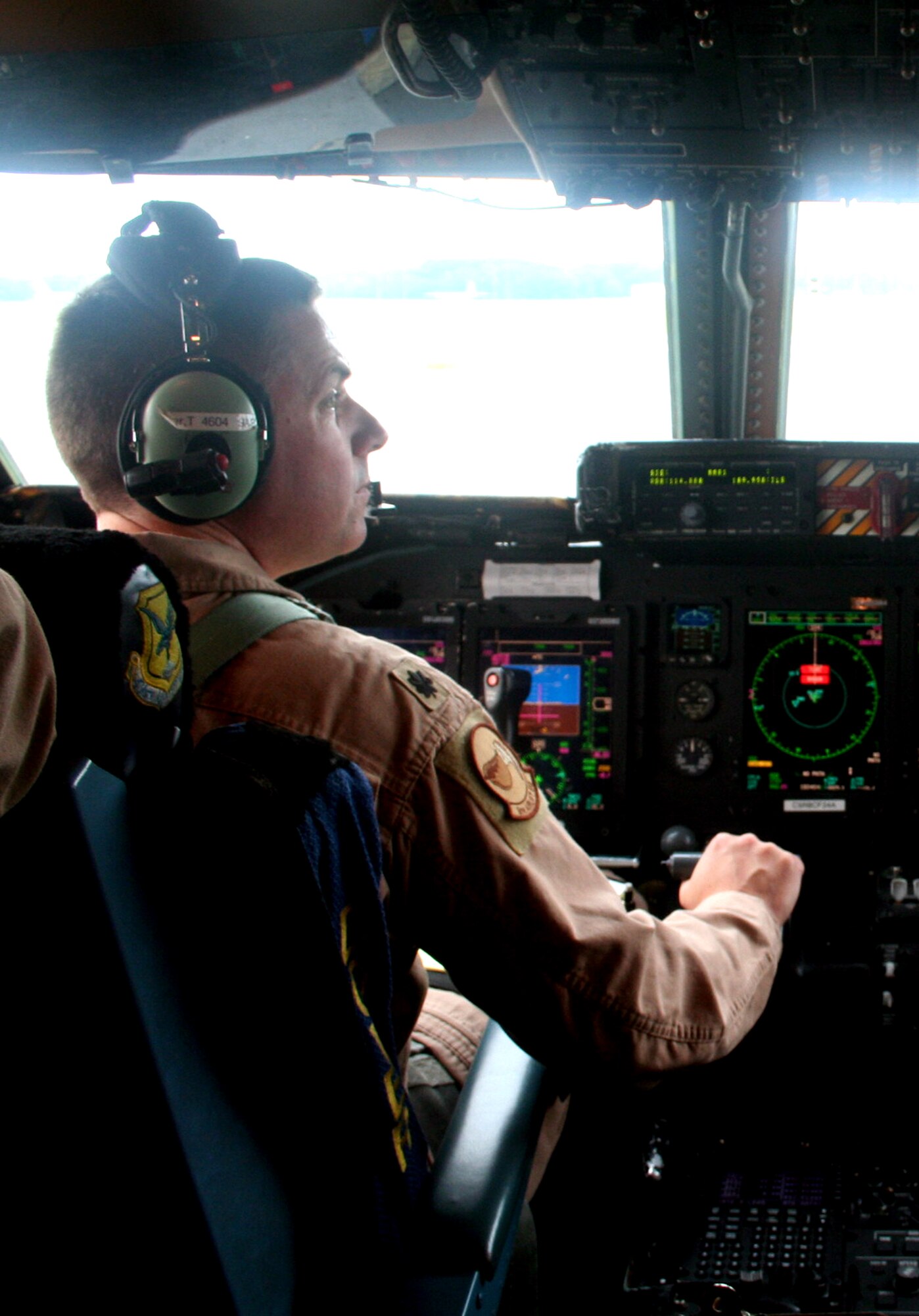 Lt. Col. Thomas Loper, C-5 pilot, prepares a C-5M Super Galaxy for a mission on June 5, 2011. The plane was departing for the Air Force's first direct delivery airlift mission through the Arctic Circle from Dover Air Force Base, Del., to Bagram Airfield, Afghanistan. Colonel Loper is the 436th Airlift Wing director of staff at Dover AFB.  (U.S. Air Force Photo/Master Sgt. Scott T. Sturkol)