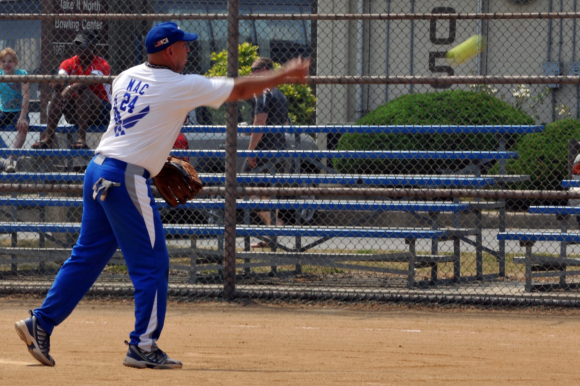 KUNSAN AIR BASE, Republic of Korea -- Tech. Sgt. Larry McEntire, 8th Aircraft Maintenance Squadron, pitches the ball during a softball game here June 12. Kunsan’s softball team will play the peninsula’s top ranked team from Camp Casey here June 18 and 19. (U.S. Air Force photo/Senior Airman Brittany Y. Bateman) 