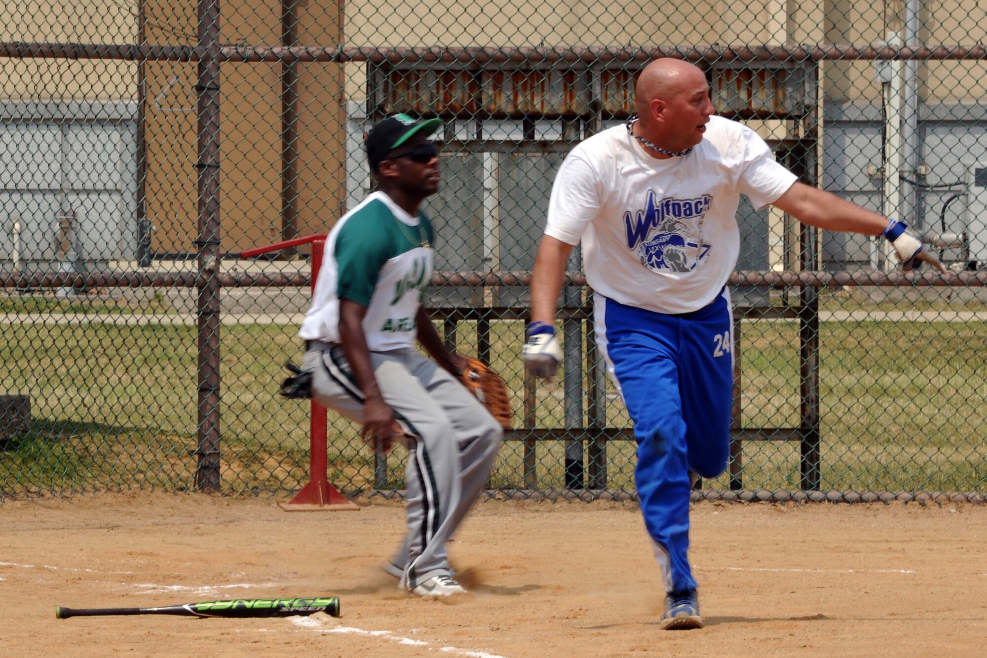 KUNSAN AIR BASE, Republic of Korea -- Tech. Sgt. Larry McEntire, 8th Aircraft Maintenance Squadron runs to first base during a softball game against the U.S. Army Garrison’s softball team from Daegu here June 12. The two teams played three games against each other, Kunsan winning a series of 3-1. (U.S. Air Force photo/Senior Airman Brittany Y. Bateman)