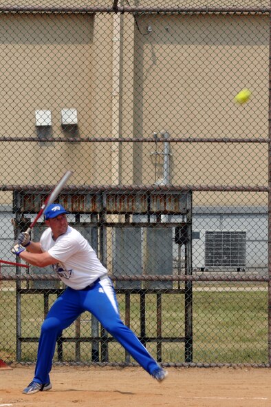 KUNSAN AIR BASE, Republic of Korea -- A member of the Kunsan’s softball team bats during a soft ball game against the U.S. Army Garrison’s softball team from Daegu here June 12. The two teams played three games against each other, Kunsan winning a series of 3-1. (U.S. Air Force photo/Senior Airman Brittany Y. Bateman)