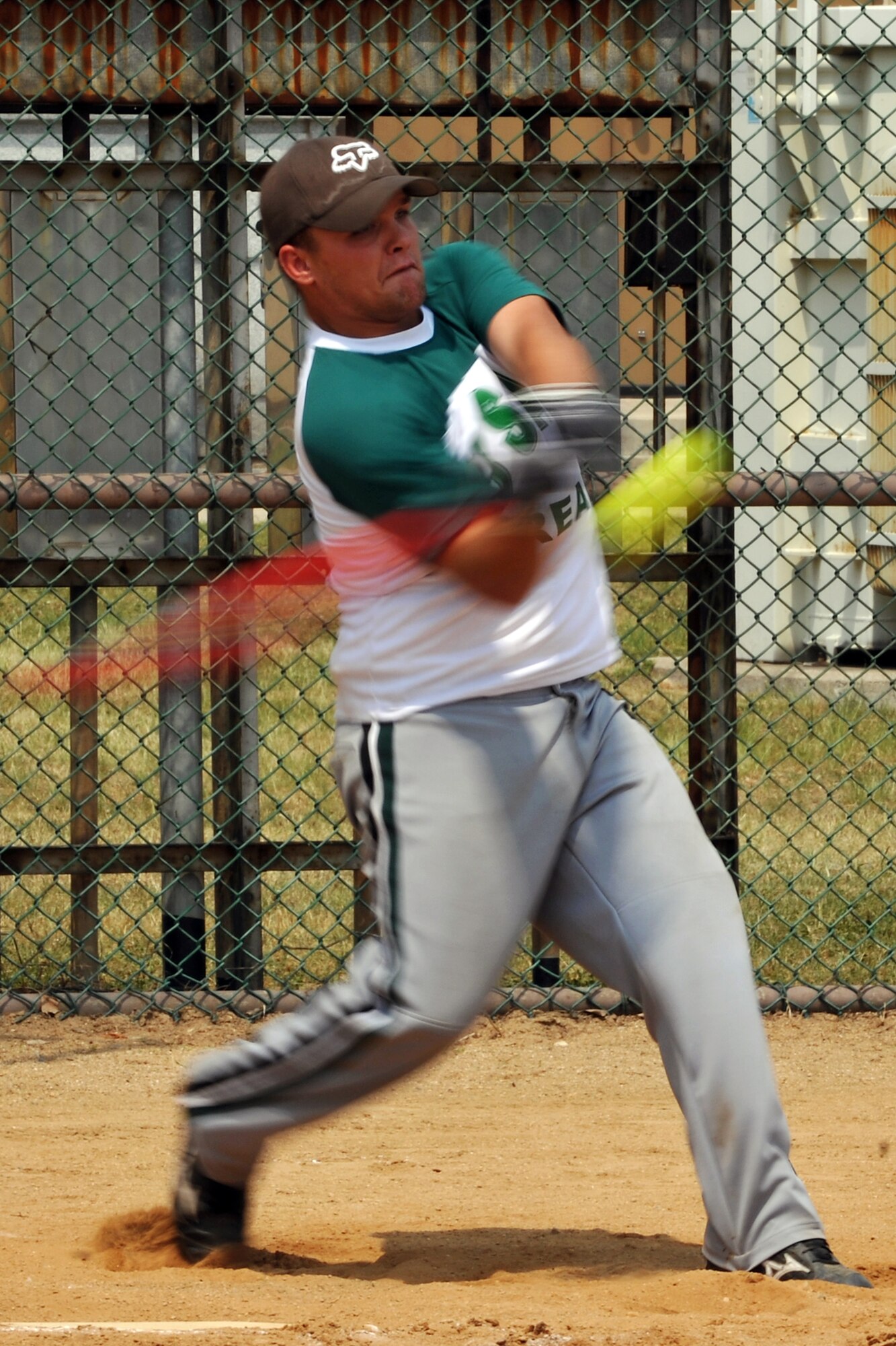 KUNSAN AIR BASE, Republic of Korea -- A member of the U.S. Army Garrison’s softball team hits the ball during a game of softball against the Kunsan’s softball team here June 12. Kunsan’s softball team will play the peninsula’s top ranked team from Camp Casey here June 18 and 19. (U.S. Air Force photo/Senior Airman Brittany Y. Bateman)