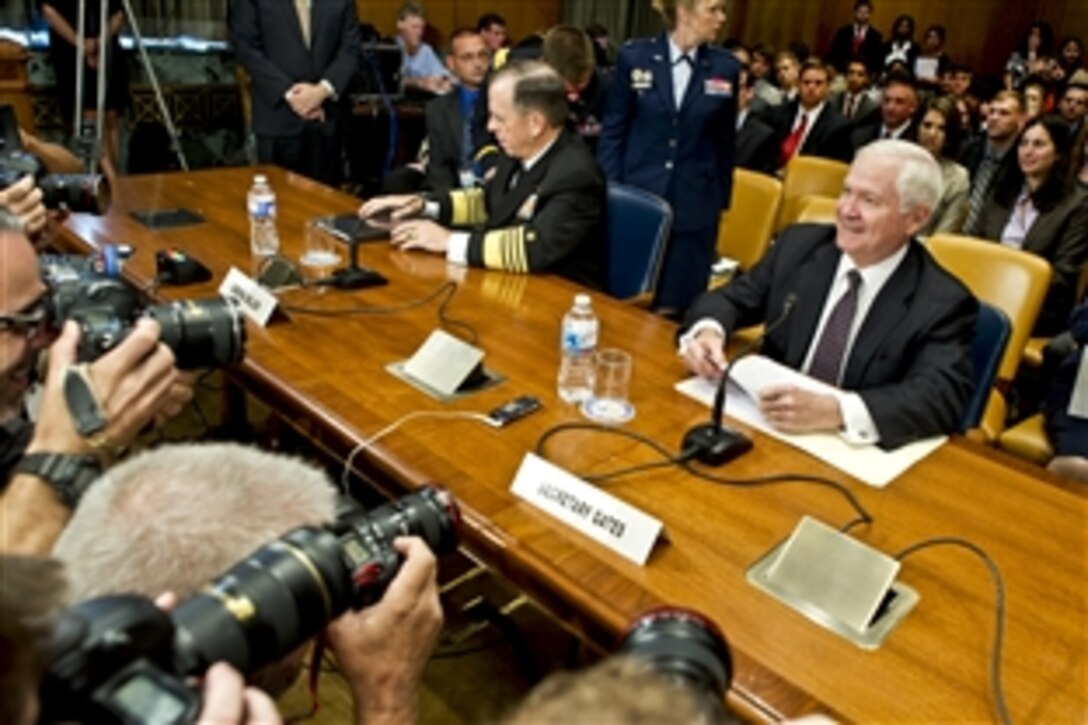 Defense Secretary Robert M. Gates and Navy Adm. Mike Mullen, chairman of the Joint Chiefs of Staff, prepare to testify before a hearing of the Senate Appropriations Committee's defense subcommittee on the Defense Department's fiscal 2012 budget at the Dirksen Senate Office in Washington, D.C., June 15, 2011.