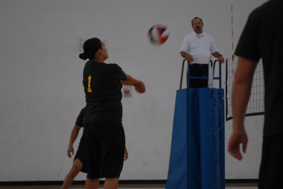 Finance and Medical battled neck and neck at the Marine Corps Recruit Depot San Diego field house June 15. Finance won the first match easily. Medical regrouped and won the second game, forcing another game to break the tie. Finance won the third match, giving them a 2-1 victory in the best two-out-of-three format.
