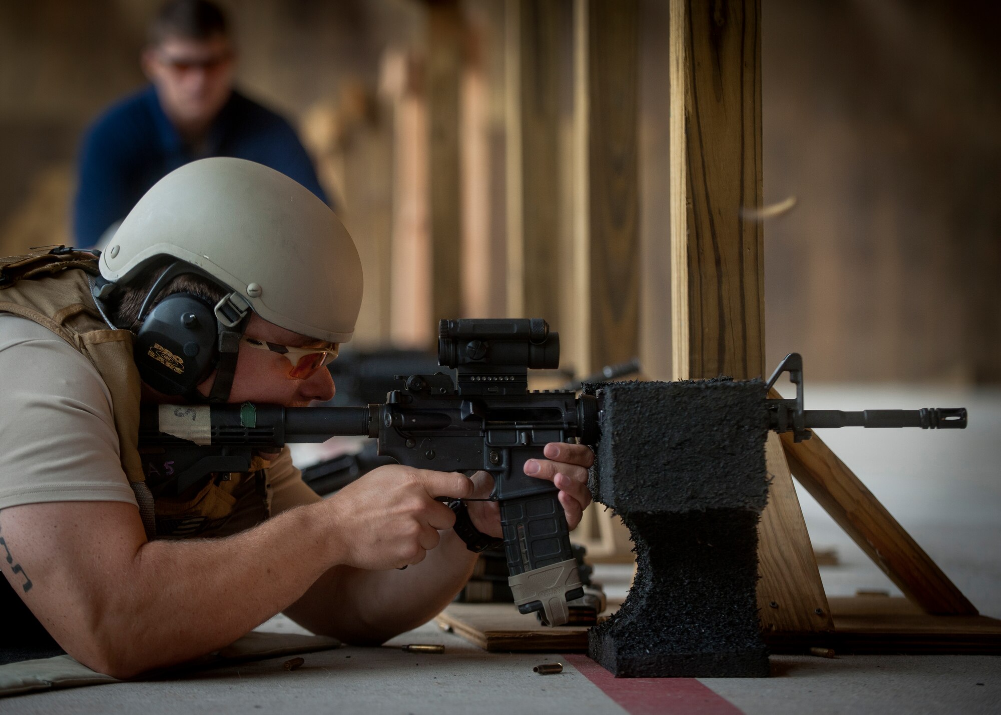 U.S. Air Force Special Agent Ben Martin, Office of Special Investigations Detachment 211, fires an M4 Carbine rifle during combat arms qualification at Moody Air Force Base, Ga., June 16. 2011. Agent Miller and other members of the AFOSI are required to annually qualify in weapons handling. (U.S. Air Force photo by Airman 1st Class Joshua Green/Released)
