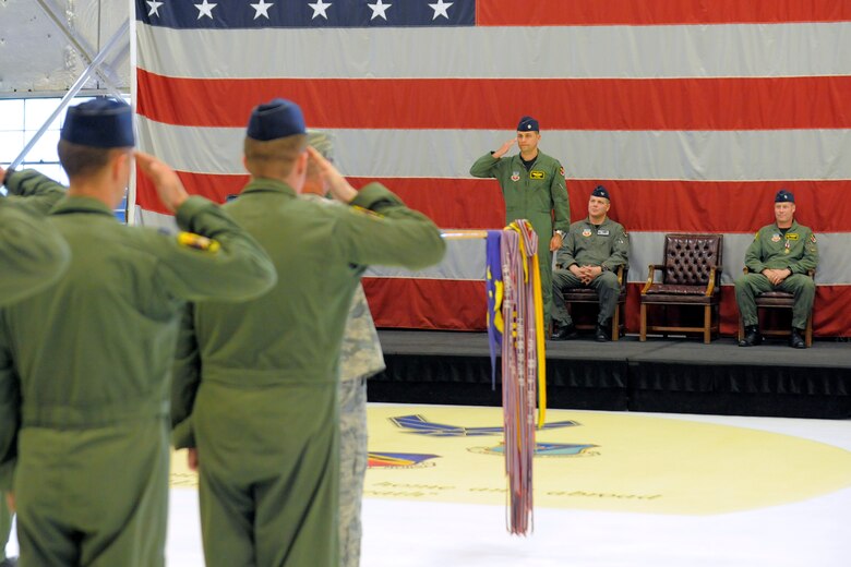 Airmen from the 4th Fighter Squadron render their first salute to their new commander, Lt. Col. Jay Sabia, right, during a change of command ceremony June 10 at Hill Air Force Base. (U.S. Air Force photo by Todd Cromar/Released)