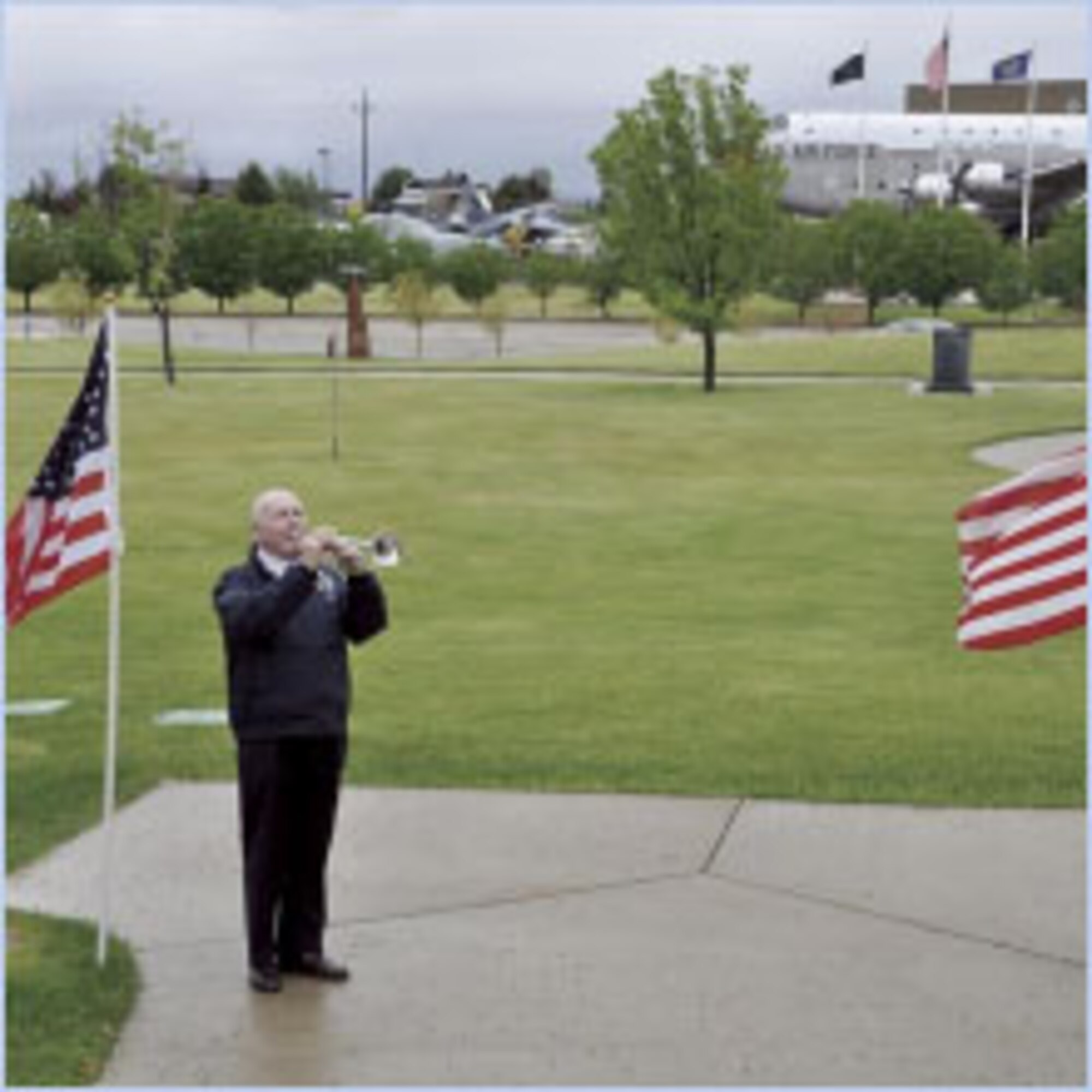 Hill Aerospace Museum volunteer Gary Thornley plays Taps at the Mazar Memorial Chapel on Memorial Day as part of a service in memory of fallen warriors. (U.S. Air Force photo by Airman 1st Class Melissa Dearstone)