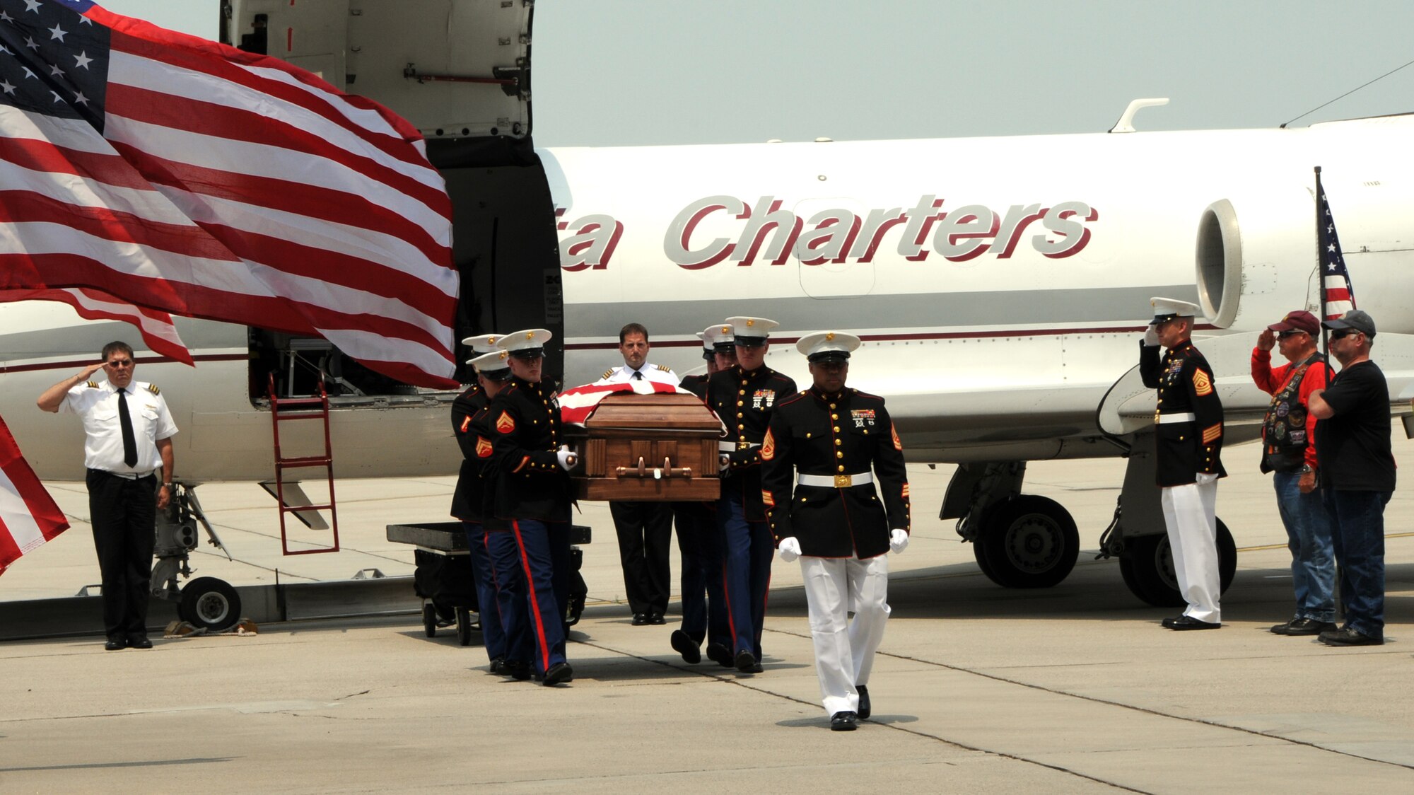 Marine pallbearers cary the remains of Cpl. Paul Zanowick in a fallen comrade ceremony June 9 at Wright Patterson Air Force Base; Ohio.; Cpl.Zanowick was killed in Afghanistan June 3 as a result of enemy fire.
