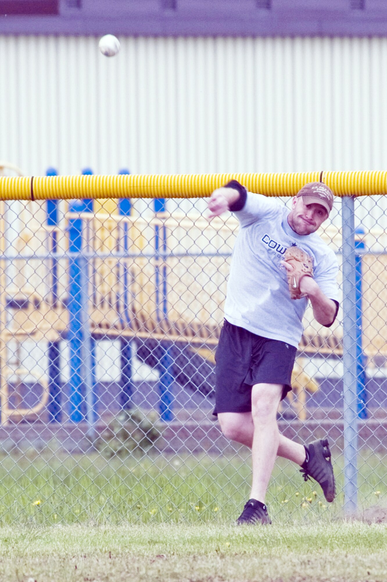 JOINT BASE ELMENDORF-RICHARDSON, Alaska ? Left fielder Mickey McAlister, of the 3rd Maintenance Squadron, throws the ball from the outfield during a game of intramural softball June 7. The 3rd MXS topped the 673d Force Support Squadron with a score of 14 to 3 starting themselves out with a 2-0 record and leaving the FSS 0-2. (Air Force photo/Senior Airman Christopher Gross)