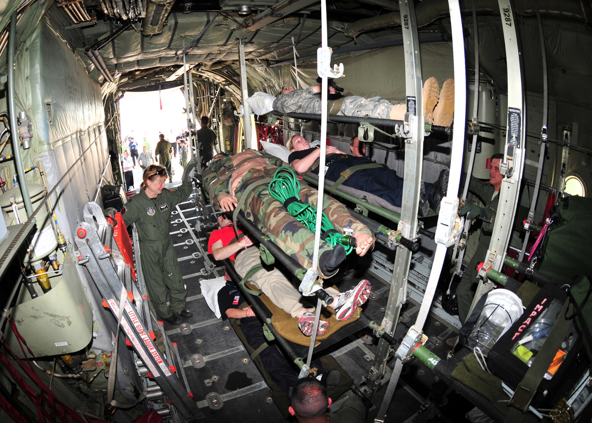 Members of the 914th Airlift Wing, along with the VA, Erie County Emergency Management Services, local fire departments and EMS engage in Operation Archangel June 15, 2011, Buffalo, NY. The exercise was a simulation of a massive earthquake that included simulated injured brought to WNY for medical treatment. (U.S. Air Force photo by Staff Sgt. Joseph McKee)