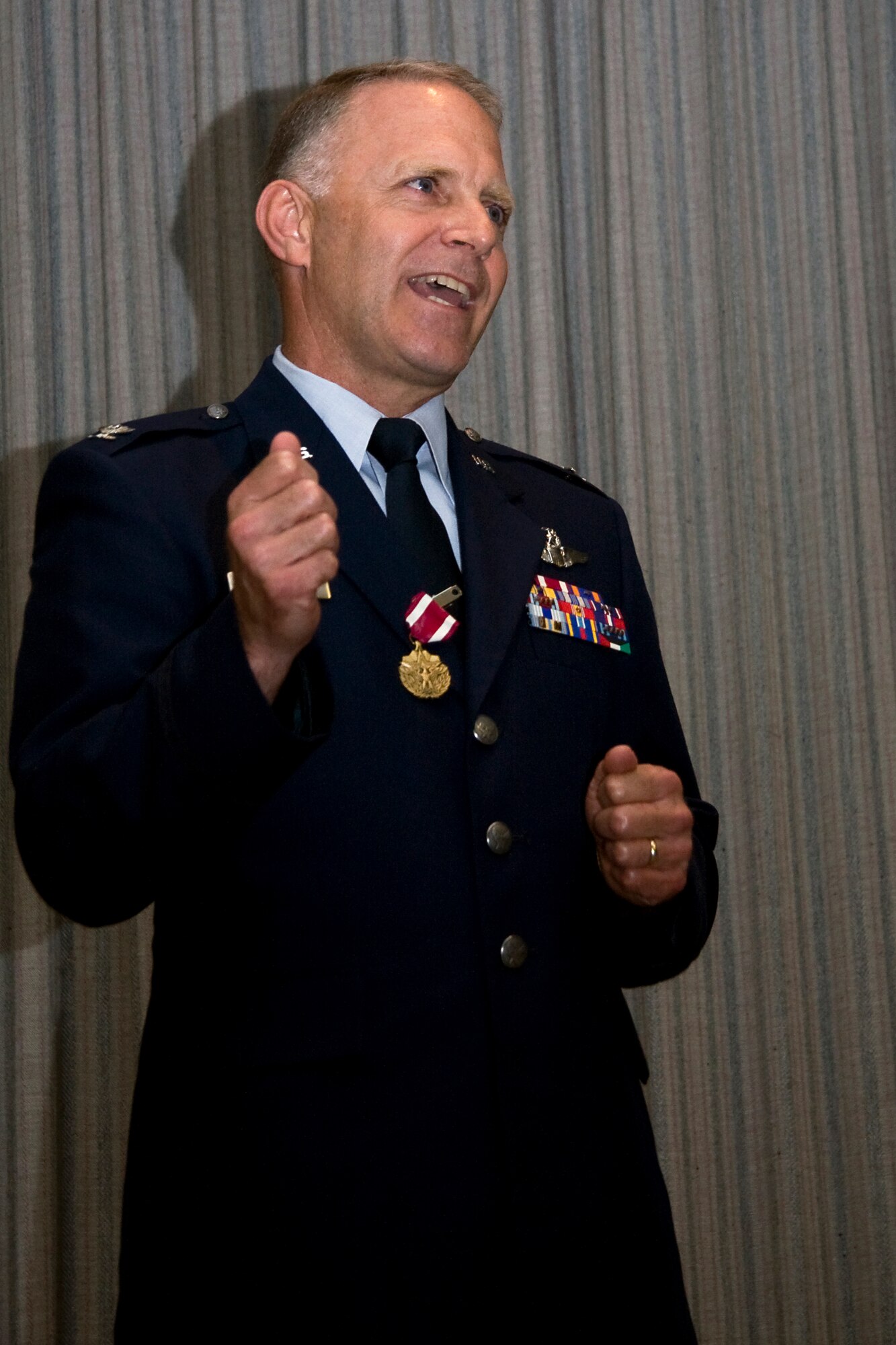 GRISSOM AIR RESERVE BASE, Ind. -- Col. Tim Cox, 434th Air Refueling Wing vice commander, speaks to a group of family, friends and coworkers during his retirement ceremony May 14. Colonel Cox served 30 years in the Air Force, 22 of which came while he was in the Air Force Reserve. (U.S. Air Force photo/Tech. Sgt. Mark R. W. Orders-Woempner) 
