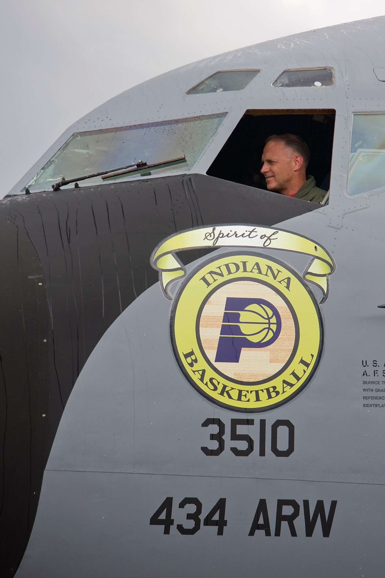 GRISSOM AIR RESERVE BASE, Ind. -- Col Tim Cox, 434th Air Refueling Wing vice commander, prepares to leave "The Spirit of Indiana Basketball," one of Grissom's KC-135R Stratotanker aircraft, after completing his final flight as a pilot in the Air Force Reserve May 13. Colonel Cox retired from the Air Force Reserve after 30 years of military service. (U.S. Air Force photo/Tech. Sgt. Mark R. W. Orders-Woempner) 

