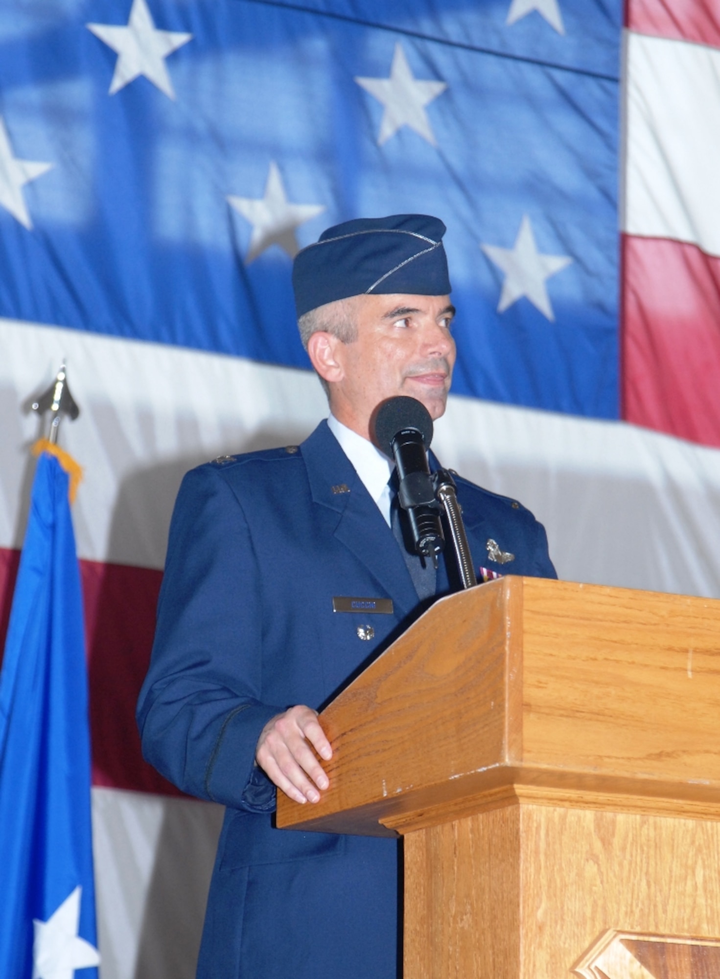 U.S. Air Force Col. Thomas Cucchi addresses members of 101st Air & Space Operations Group (101st AOG) for the first time as the new commander of the 101st AOG during a change of command ceremony held here June 11, 2011.  This was the very first change of command ceremony for the 101st AOG, which was officially activated July 1, 2009. (U.S. Air Force photo by Maj. Steve Burke/Released)