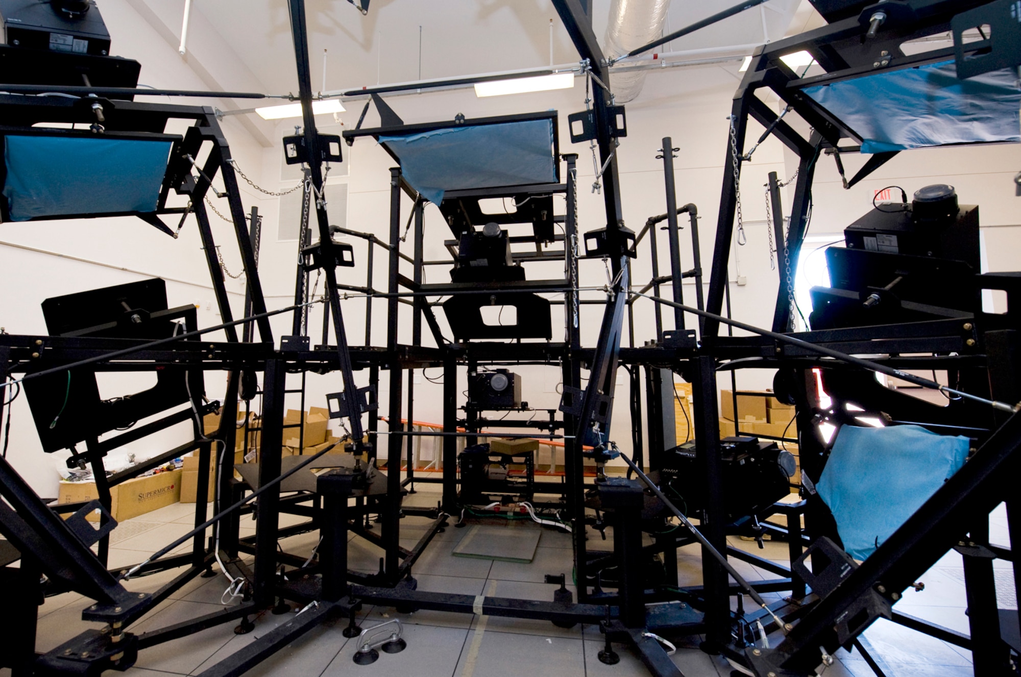 The outer frame of the new F-16 Fighting Falcon Mission Training Center flight simulator stands completed June 13, 2011, during the installation phase at Nellis Air Force Base, Nev. (U.S Air Force photo/Senior Airman Stephanie Rubi)