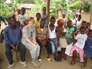 Capt. Lisa Gerlt visits with residents of a local village in St. Paul River outside the capital city of Monrovia, Liberia. Gerlt is deployed from Headquarters Air Combat Command Directorate of Requirements to serve as a Military Observer for the United Nations Mission in Liberia. (Courtesy photo)