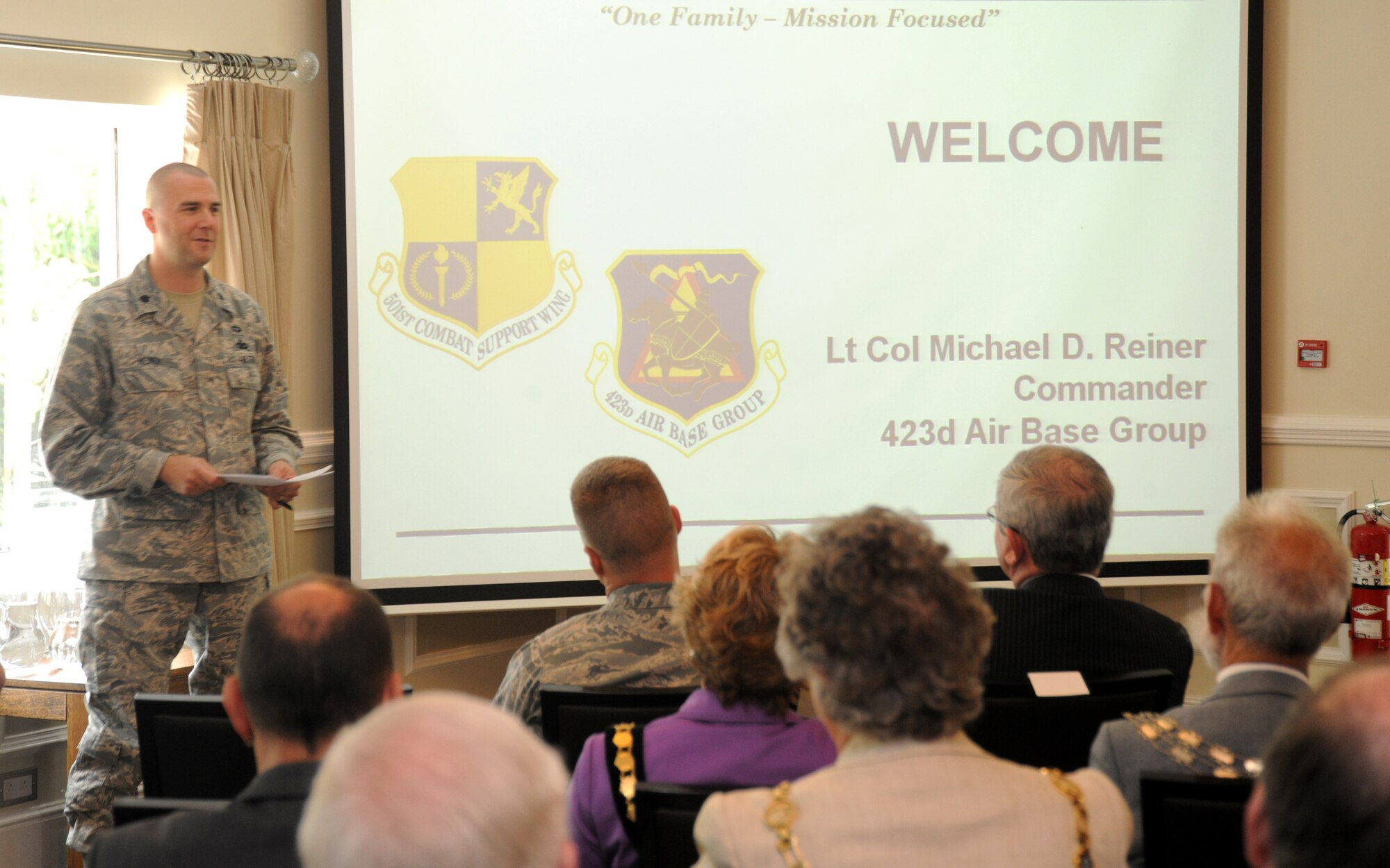 Lt. Col. Michael Reiner, 423rd Air Base Group commander, briefs local civic leaders about the missions supported by the 423rd ABG. Civic leaders from the tribase area received informational briefs about the 501st Combat Support Wing, 423rd ABG, and mission partners, as well as a tour of RAF Alconbury and RAF Molesworth. (U.S. Air Force photo/1st Lt. Brian Maguire)