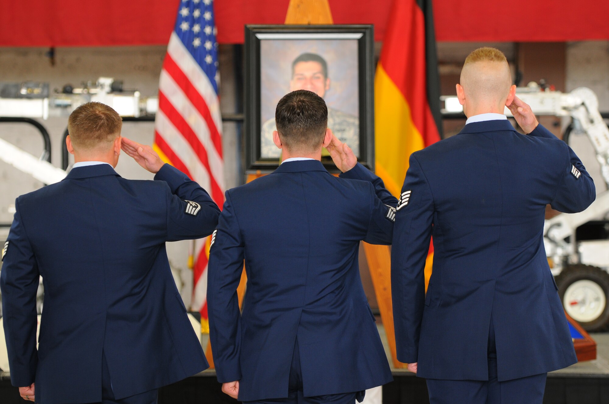 SPANGDAHLEM AIR BASE, Germany – Airmen from the 52nd Civil Engineer Squadron Explosive Ordnance Flight, pay respects to fellow flight member Staff Sgt. Joseph J. Hamski’s Fallen Airman Memorial during his memorial service held here June 16. Sergeant Hamski was killed in action May 26, 2011, in Shorabak, Afghanistan, while responding to a known enemy weapons cache. (U.S. Air Force photo/Airman 1st Class Dillon Davis)