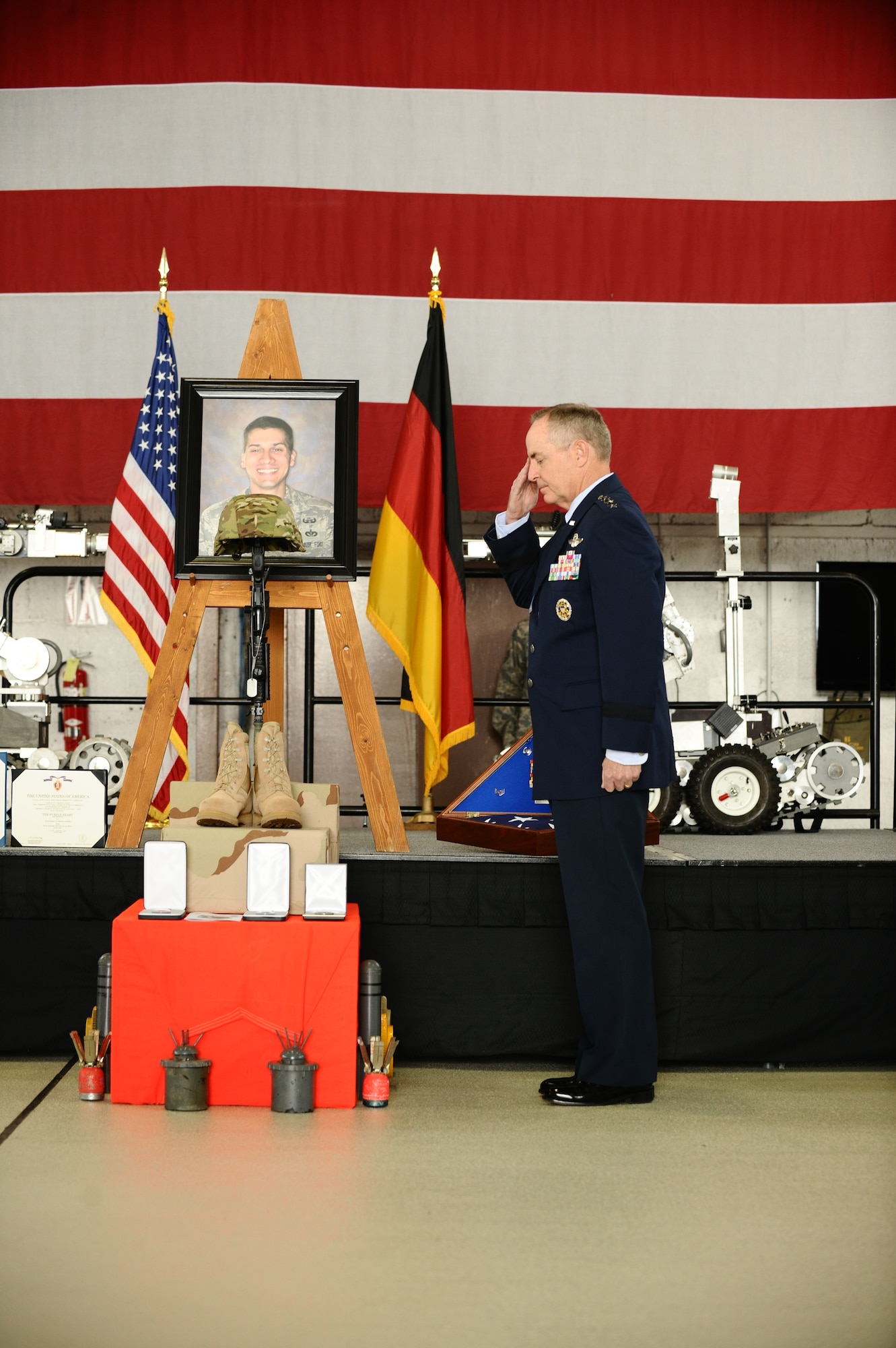 SPANGDAHLEM AIR BASE, Germany – Gen. Mark A. Welsh III, U.S. Air Forces in Europe commander, salutes the Fallen Airman Memorial of Staff Sgt. Joseph J. Hamski, 52nd Civil Engineer Squadron Explosive Ordnance Disposal Flight, after posthumously presenting him the Bronze Star, Purple Heart and Air Force Commendation Medals during Sergeant Hamski’s memorial service here June 16. Sergeant Hamski was killed in action May 26, 2011, in Shorabak, Afghanistan, while responding to a known enemy weapons cache. (U.S. Air Force photo/Senior Airman Nathanael Callon)