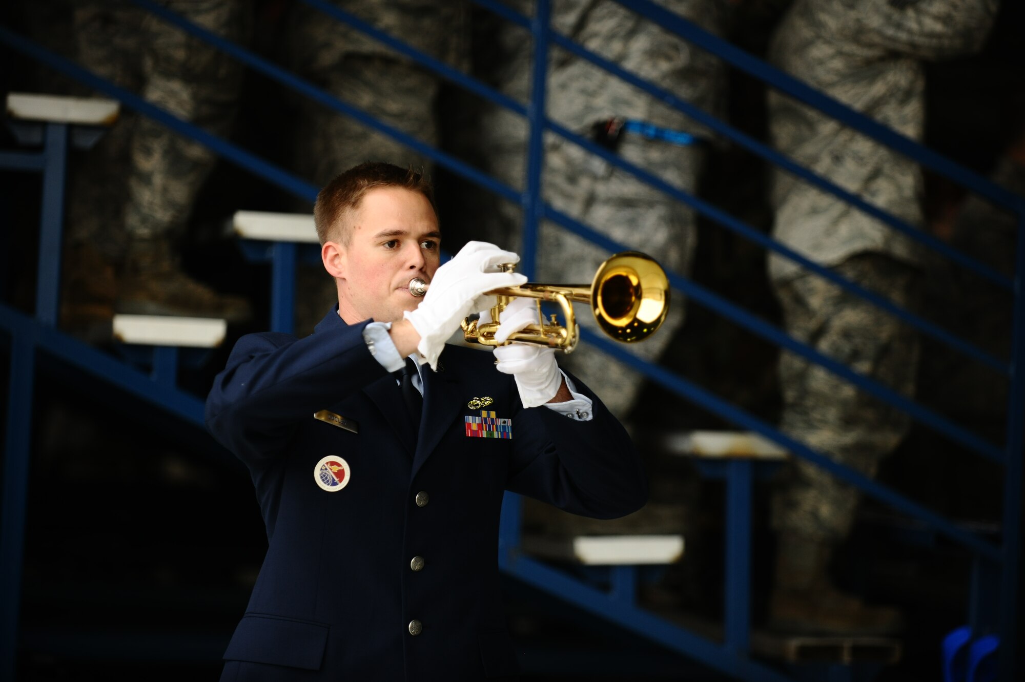 SPANGDAHLEM AIR BASE, Germany – Tech. Sgt. Nicholas Cooley, 52nd Force Support Squadron, performs Taps on his trumpet during the memorial service for Staff Sgt. Joseph J. Hamski, 52nd Civil Engineer Squadron Explosive Ordnance Disposal Flight, held here June 16. Sergeant Hamski was killed in action May 26, 2011, in Shorabak, Afghanistan, while responding to a known enemy weapons cache. (U.S. Air Force photo/Senior Airman Nathanael Callon)