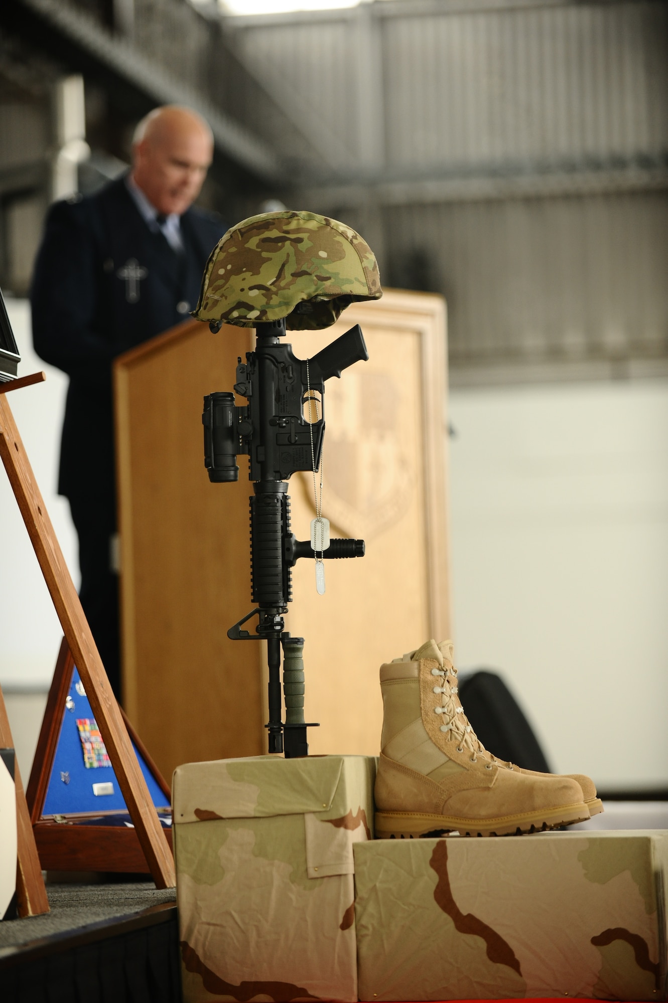 SPANGDAHLEM AIR BASE, Germany – Chaplain Capt. Paul Joyner, 52nd Fighter Wing chaplain, prays during the memorial service for Staff Sgt. Joseph J. Hamski, 52nd Civil Engineer Squadron Explosive Ordnance Disposal Flight, held here June 16. Sergeant Hamski was killed in action May 26, 2011, in Shorabak, Afghanistan, while responding to a known enemy weapons cache. (U.S. Air Force photo/Senior Airman Nathanael Callon)