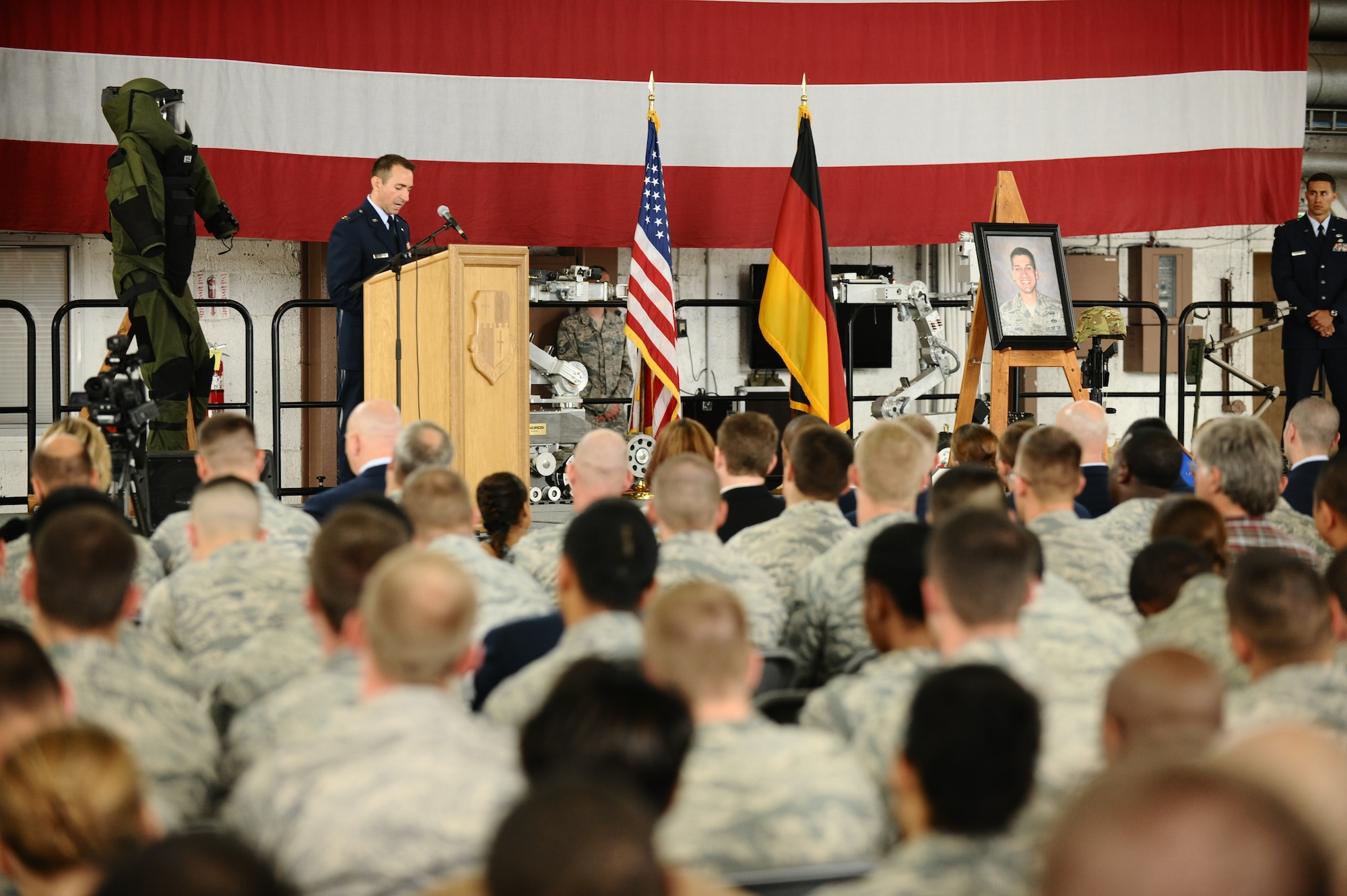 SPANGDAHLEM AIR BASE, Germany – Capt. Matthew Borawski, 52nd Civil Engineer Squadron Explosive Ordnance Disposal Flight commander, speaks during the memorial service for Staff Sgt. Joseph J. Hamski, 52nd CES EOD Flight, held here June 16. Sergeant Hamski was killed in action May 26, 2011, in Shorabak, Afghanistan, while responding to a known enemy weapons cache. (U.S. Air Force photo/Senior Airman Nathanael Callon)