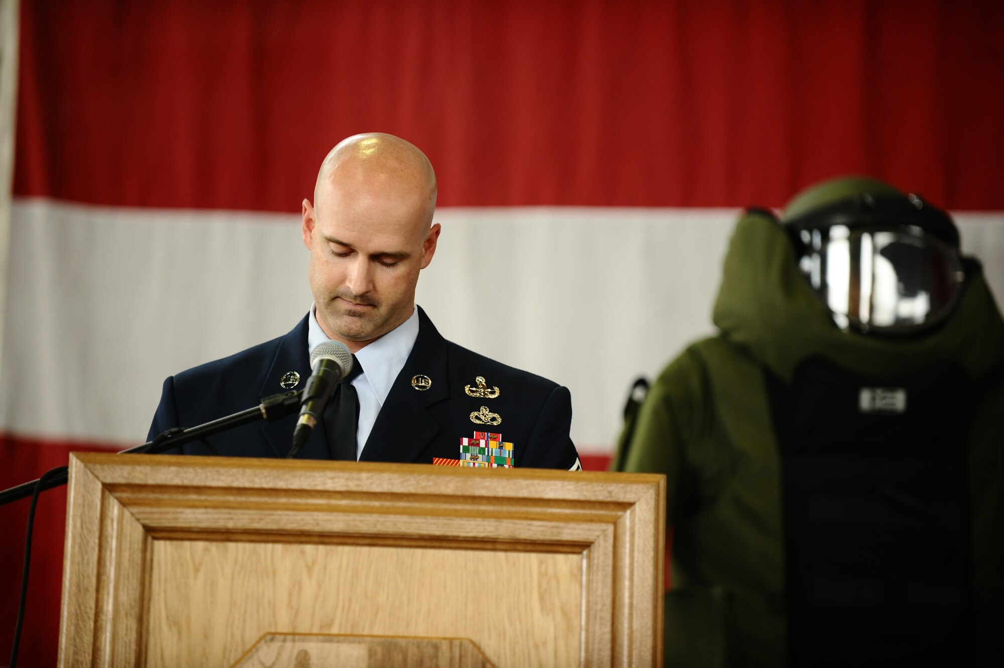 SPANGDAHLEM AIR BASE, Germany – Senior Master Sgt. Neil Jones, 52nd Civil Engineer Squadron Explosive Ordnance Disposal Flight, speaks during the memorial service for Staff Sgt. Joseph J. Hamski, 52nd CES EOD Flight, held here June 16. Sergeant Hamski was killed in action May 26, 2011, in Shorabak, Afghanistan, while responding to a known enemy weapons cache. (U.S. Air Force photo/Senior Airman Nathanael Callon)