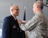 During a Change of Command ceremony for the 64th Air Refueling Squadron, Major General William N. Reddel, III, the Adjutant General, New Hampshire National Guard (right) awards relinquishing commander Lieutenant Colonel Christopher Leist with the New Hampshire National Guard Distinguished Service medal, June 2, 2011, Pease Air National Guard Base, NH.  (U.S. Air Force photo/Staff Sgt. Curtis J. Lenz)