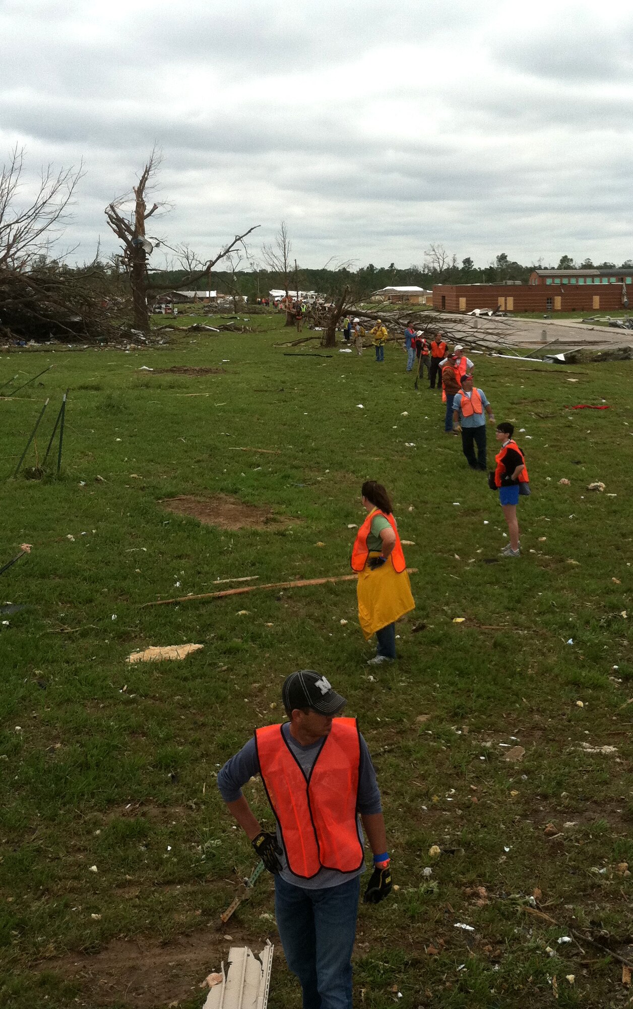 Volunteers prepare to begin a search for missing people in Joplin, Mo., May 24, 2011.  A tornado detroyed much of the town on May 22, 2011.  In addition to search and rescue missions, volunteers handed out bottled water and assisted the residents with salvaging household items. (courtesy photo)(RELEASED)
