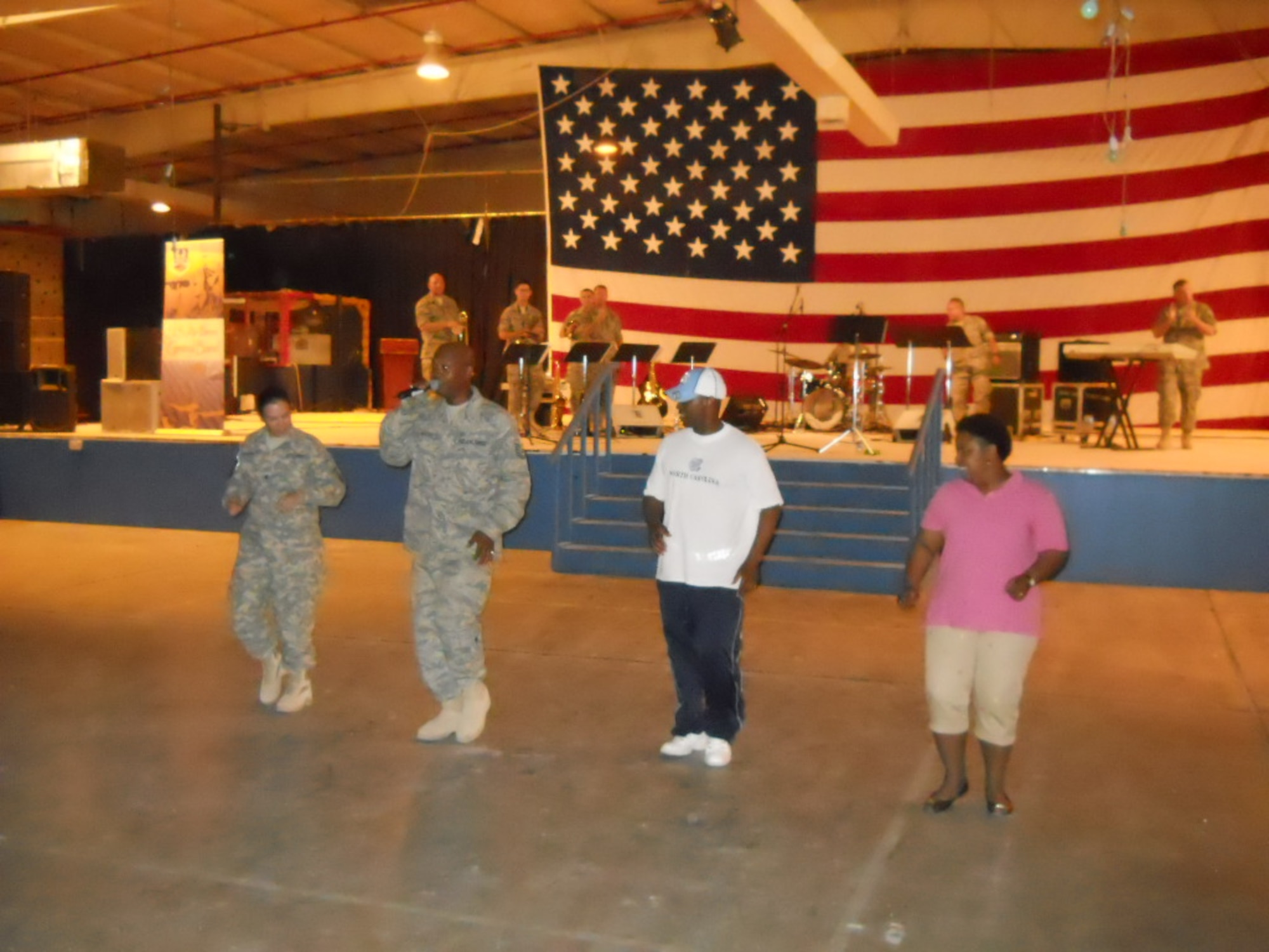 Tech. Sgt. Lane McCray, AFCENT Band Blue Hawk, performs at an Army installation at an undisclosed location in Southwest Asia June 8. (U.S. Air Force photo by Master Sgt. Joseph LeBlanc)