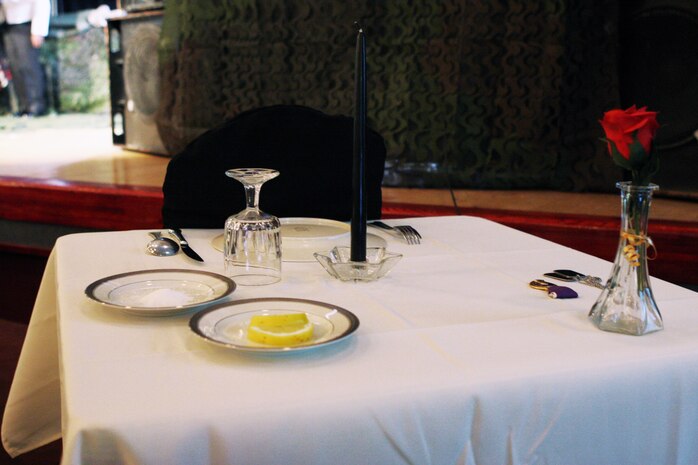 A single table was set aside in memory of corpsmen who have lost their lives during the 113 year history of the Navy Corpsmen rate during the 2011 Navy Hospital Corpsmen Ball at the Club Iwakuni ballroom here June 17. Corpsmen have long sacrificed their lives in service to Marines and country as well.