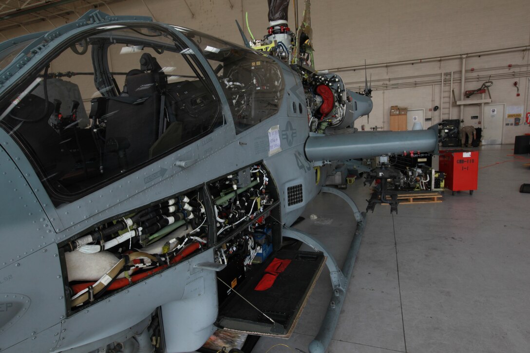 An AH-1Z Super Cobra from Marine Medium Helicopter Squadron 268 (Rein), undergoes planned maintenance here June 16.  The squadron is the aviation combat element for the 11th Marine Expeditionary Unit.