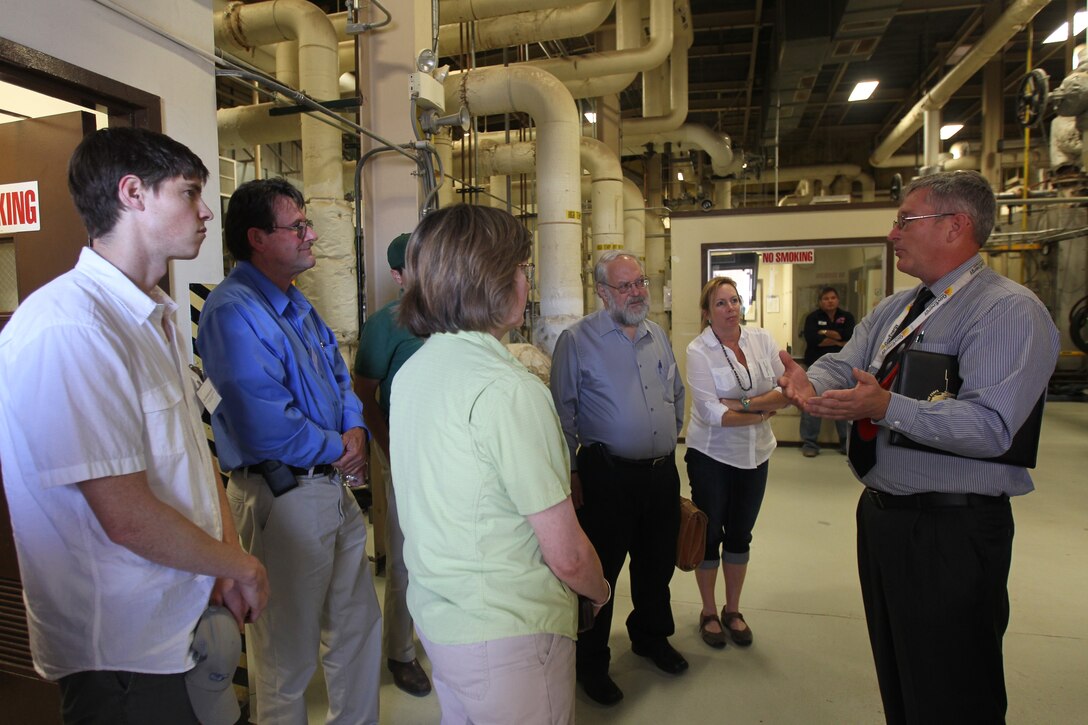 Aides for the California district 18 senator, Senator Jean Fuller, listen to a specialist at the  Combat Center’s co-generation plant durin their tour of the Combat Center June 17, 2011.::r::::n::