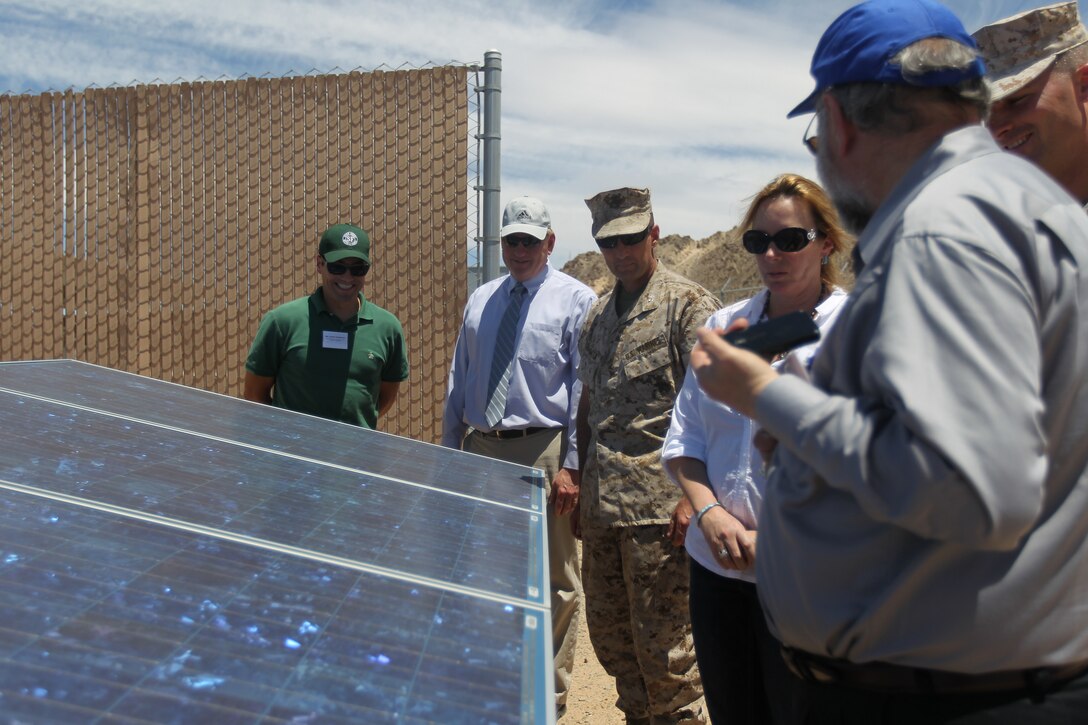 Aids with the California district 18 senator, Senator Jean Fuller, tour the Combat Center’s co-generation plant during the senators tour of the Combat Center June 17, 2011.