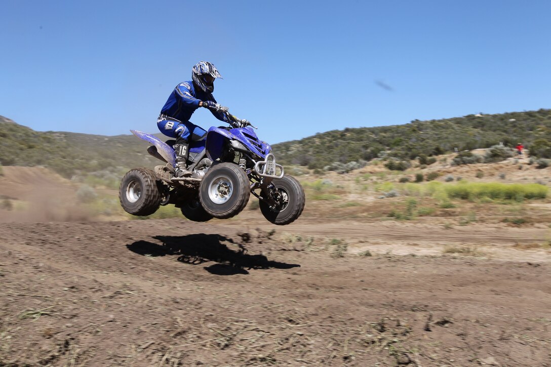 An ATV rider hits a 15 foot “table top” on Thunder Horse Ranch’s advanced track. Thunder Horse Ranch hosted up to 100 riders a day.::r::::n::