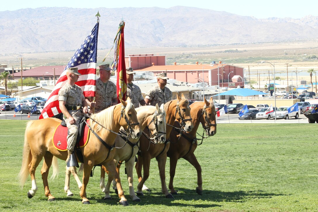 The mounted color guard, based at Marine Corps Logistics Base, Barstow, Calif., provided a unique aspect to the Wolfpack’s change of command ceremony June 17, 2011. This color guard is the only remaining such unit within the Marine Corps.::r::::n::