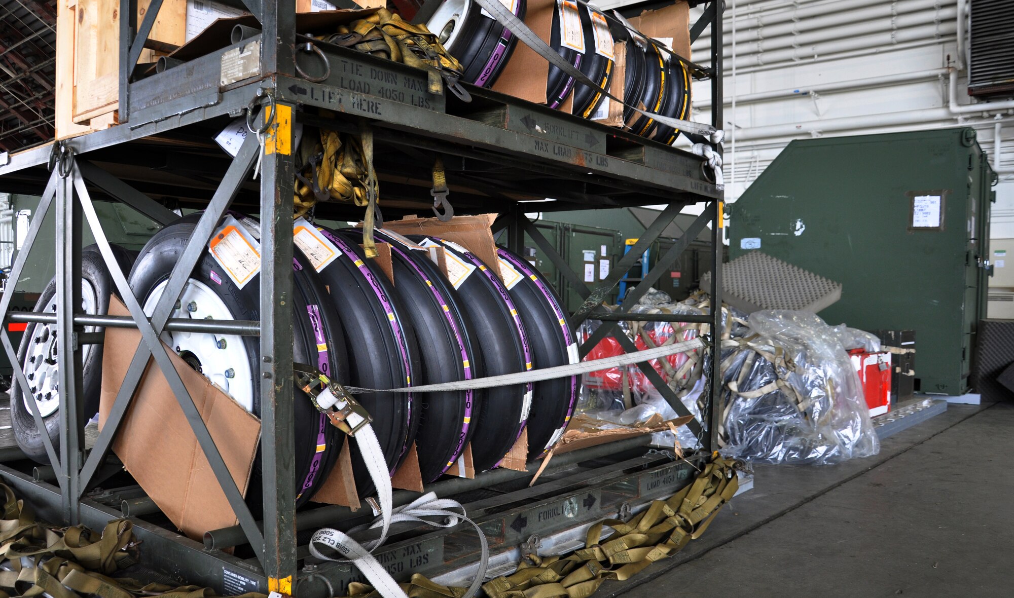 Tires line the shelves near the 67th Aircraft Maintenance Unit's exercise headquarters during the Northern Edge Premier Joint Training Exercise, June 16, 2011 at Eielson Air Force Base, Alaska. Tires are part of the "kits" the 67th AMU, which is based out of Kadena Air Base, Japan, brought to help get grounded aircraft get back into the skies. (U.S. Air Force photo by Staff Sgt. Amanda Dick)
