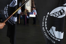 Joint military members from the island of Oahu transfer the remains of a U.S. service member, recovered by the Joint Pacific Accounting Command, during an arrival ceremony on Joint Base Pearl Harbor-Hickam, Hawaii June 17. Three flag draped caskets carried military members from World War II and the Vietnam War. The remains were recovered in Laos, Vietnam and Papua New Guinea. Following the ceremony with full military honors, the remains will be sent to JPAC's Central Identification Laboratory where forensic identification analysis will be conducted so the remains may be identified and returned to the members family. (U.S. Air Force photo/Senior Airman Lauren Main)