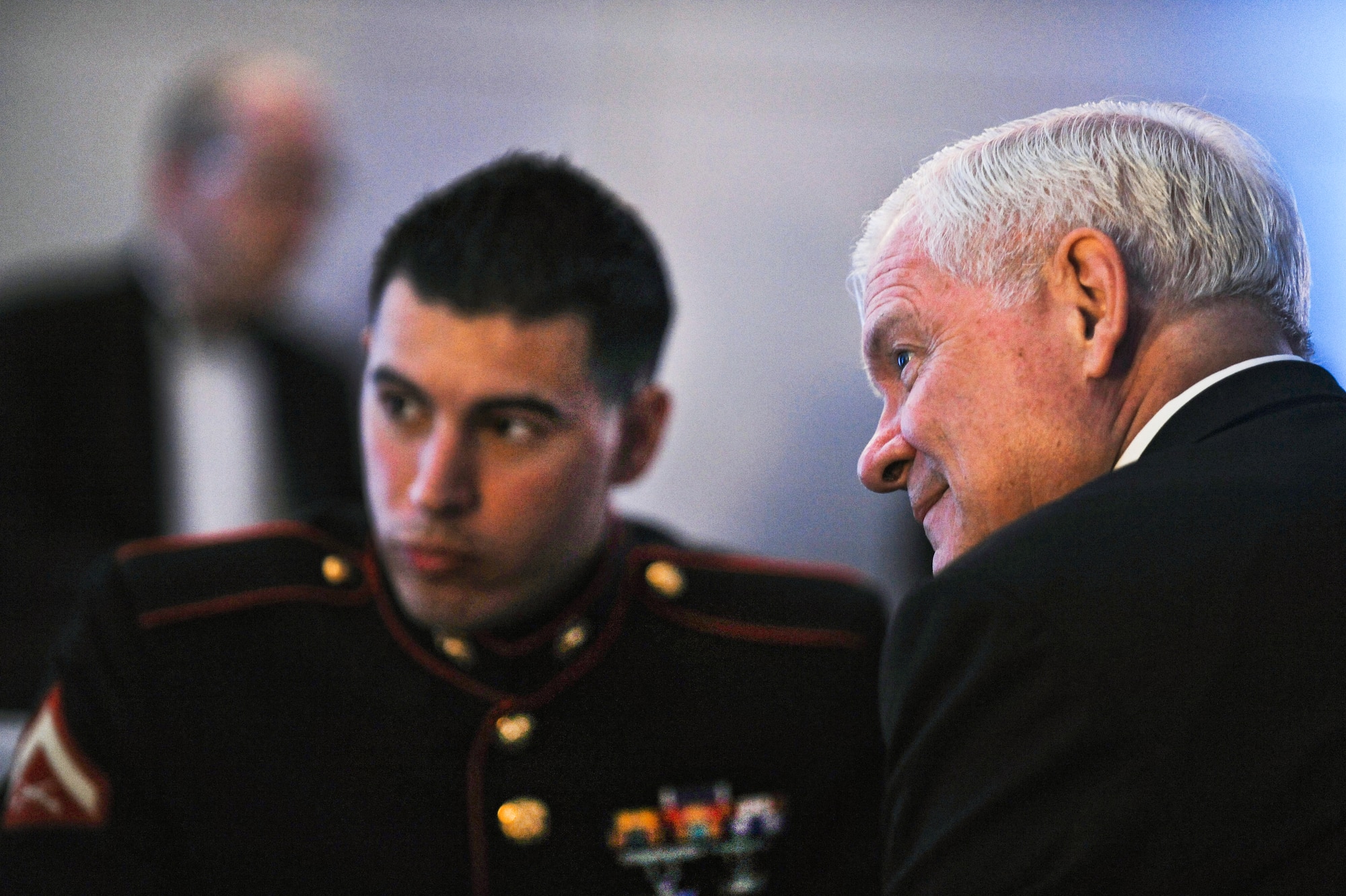 Defense Secretary Robert Gates sits with service members previously wounded in action during the Bob Woodruff Foundation's Stand Up for Heroes event at the Ronald Reagan Building and International Trade Center in Washington, D.C., June 16, 2011. The event raised funds to support injured service members, veterans and their families. (Defense Department photo/Tech. Sgt. Jacob N. Bailey)