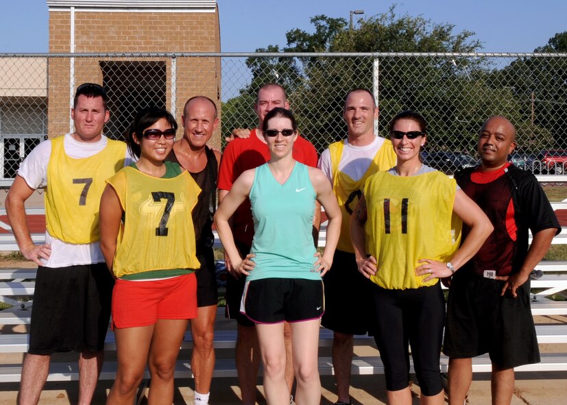 Members of the Air Force Global Strike Command A6 team and the 2nd Civil Engineer Squadron team pose for a photo at the fitness center on Barksdale Air Force Base, La., June 16. The 2 CES came in 1st and AFGSC/A6 placed 2nd during the competition, which tested their physical endurance, strength and team camaraderie. (U.S. Air Force photo/Senior Airman La'Shanette V. Garrett) (RELEASED)