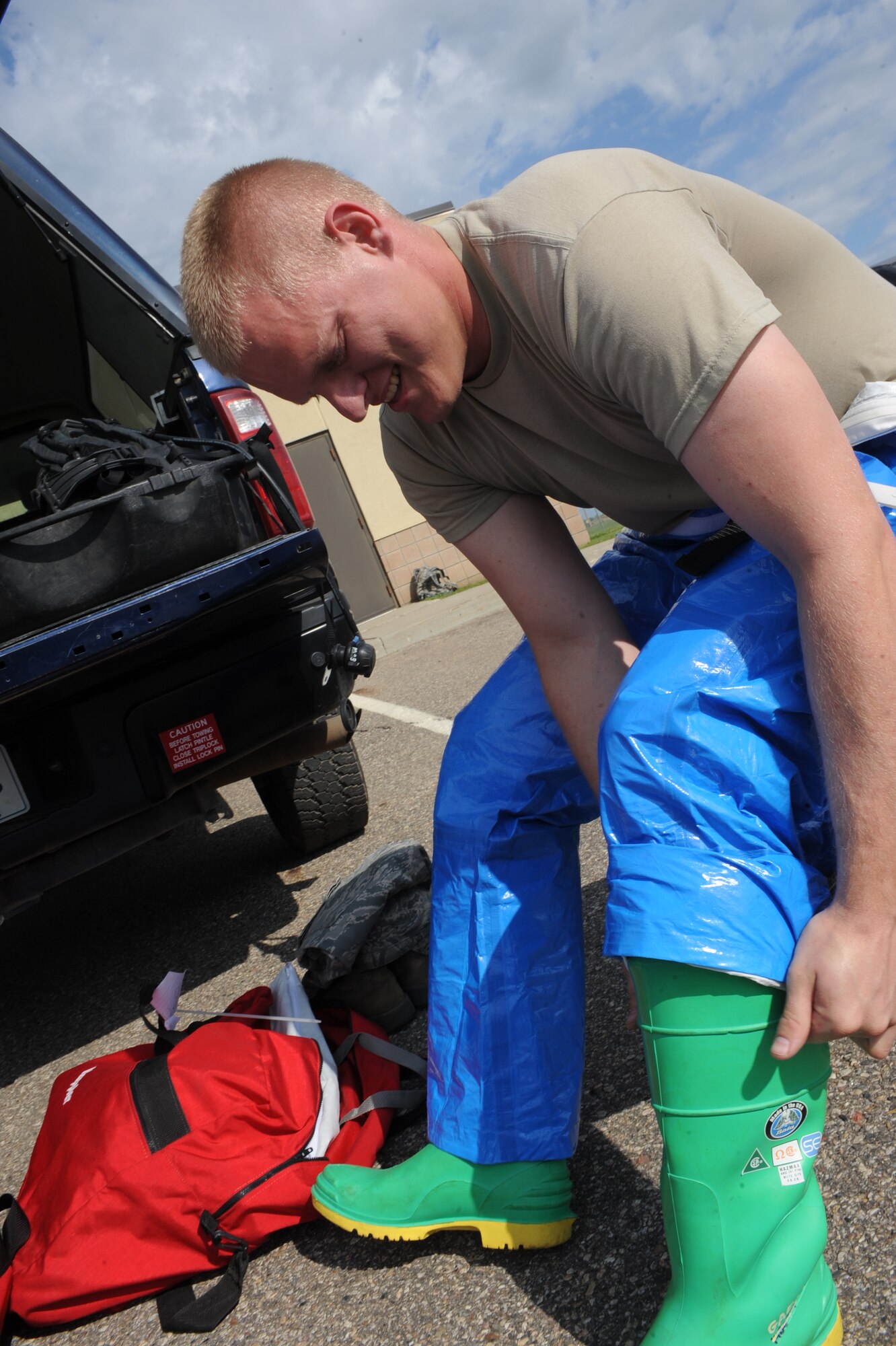 MINOT AIR FORCE BASE, N.D. -- Staff Sgt. James Hardy, 91st Missile Maintenance Squadron maintenance technician, ensures his gear is properly fitted before entering the Uniform-1 Missile Training Facility, as a part of an exercise here June 16. The exercise is designed to evaluate the response capabilities of maintenance personnel here during a simulated major accident at a launch facility. (U.S. Air force photo/Senior Airman Aaron-Forrest Wainwright)