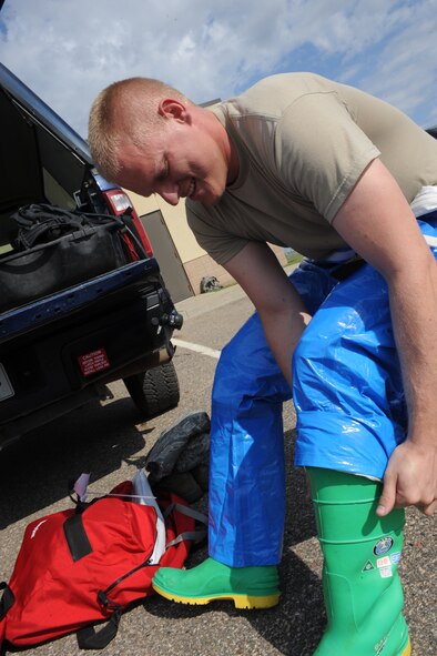 MINOT AIR FORCE BASE, N.D. -- Staff Sgt. James Hardy, 91st Missile Maintenance Squadron maintenance technician, ensures his gear is properly fitted before entering the Uniform-1 Missile Training Facility, as a part of an exercise here June 16. The exercise is designed to evaluate the response capabilities of maintenance personnel here during a simulated major accident at a launch facility. (U.S. Air force photo/Senior Airman Aaron-Forrest Wainwright)
