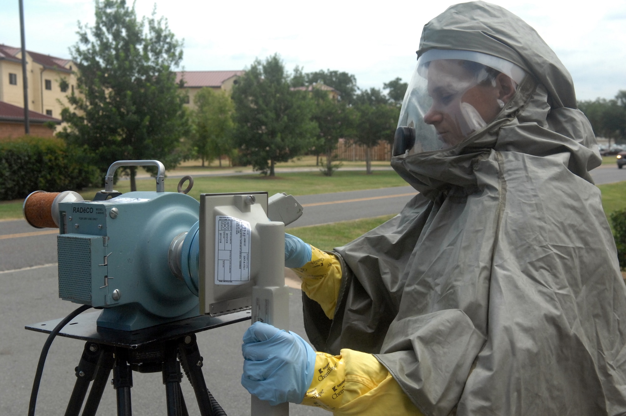 Staff Sgt. Marie Miller, a reserve bioenvironmental engineer, monitors air samples while performing radiation monitoring June 16 on Barksdale Air Force Base, La. The 2nd Aerospace Medicine Squadron bioenvironmental engineering technicians are responsible for the occupational and industrial health of all Airman and buildings on Barksdale. (U.S. Air Force photo/Senior Airman Allison M. Boehm)(RELEASED)